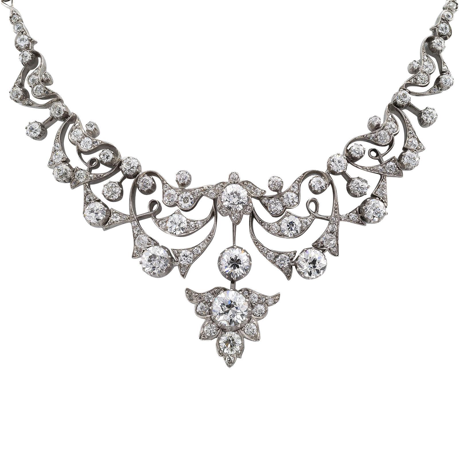 Victorian diamond and silver over gold necklace circa 1890. *
ABOUT THIS ITEM:  Behold a dreamy creation from a long bygone era. Entirely set with eleven carats of old-cut diamonds that sparkle with intensity and sprinkle rays of colored light into