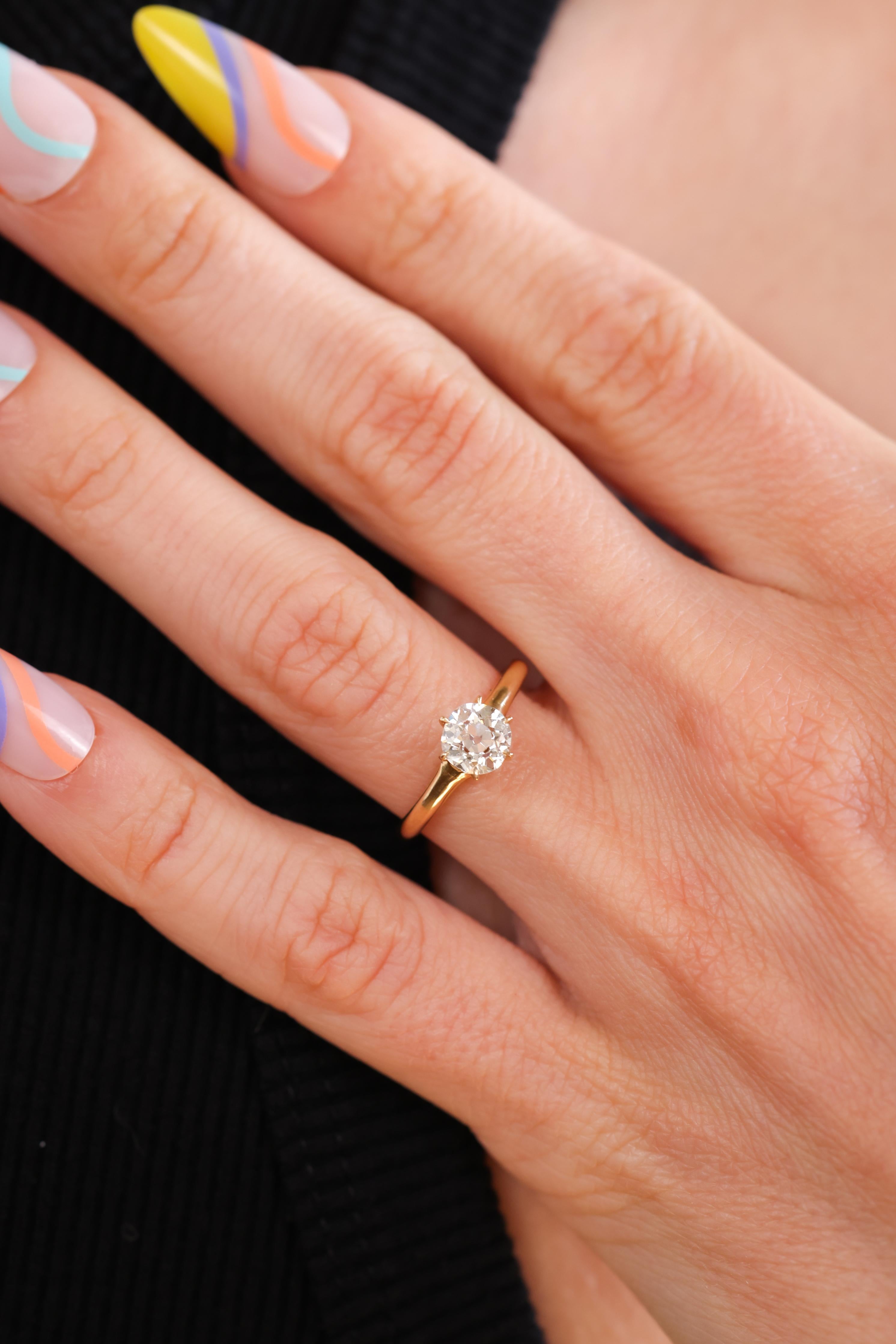 This is a classic and authentic antique Victorian diamond solitaire. The ring centers a beautiful six-prong set Old Mine Cut diamond accompanied by a GIA Diamond Dossier stating the 0.88ct stone is J color and VS2 clarity. Crafted in 14k yellow gold