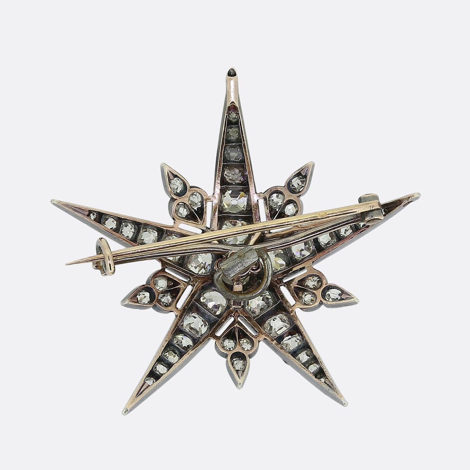 Here we have a glorious diamond brooch dating back to the Victorian era. This antique piece has been crafted from yellow gold into the shape of a 5 pointed star consisting of round faceted old cut diamonds; each of which is separated by a tiny