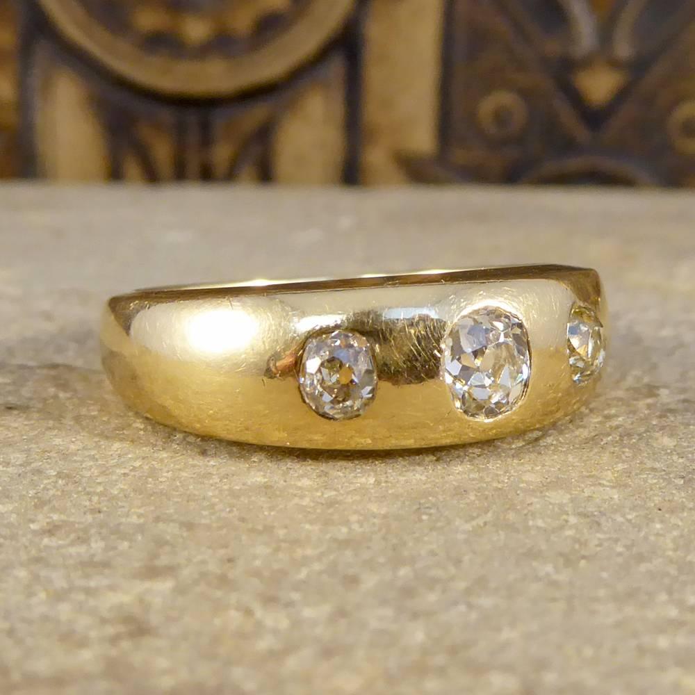 This antique Victorian three stone Diamond gypsy ring has a max band width of 6.5mm and a min band width of 3mm. To be worn by either men or women this stunning 18ct yellow Gold gypsy ring features three gorgeous bright Diamonds weighing a total of