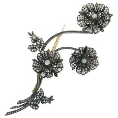 Broche à clip à fleurs ancienne de taille française et de style victorien en or 18 carats et argent avec diamants