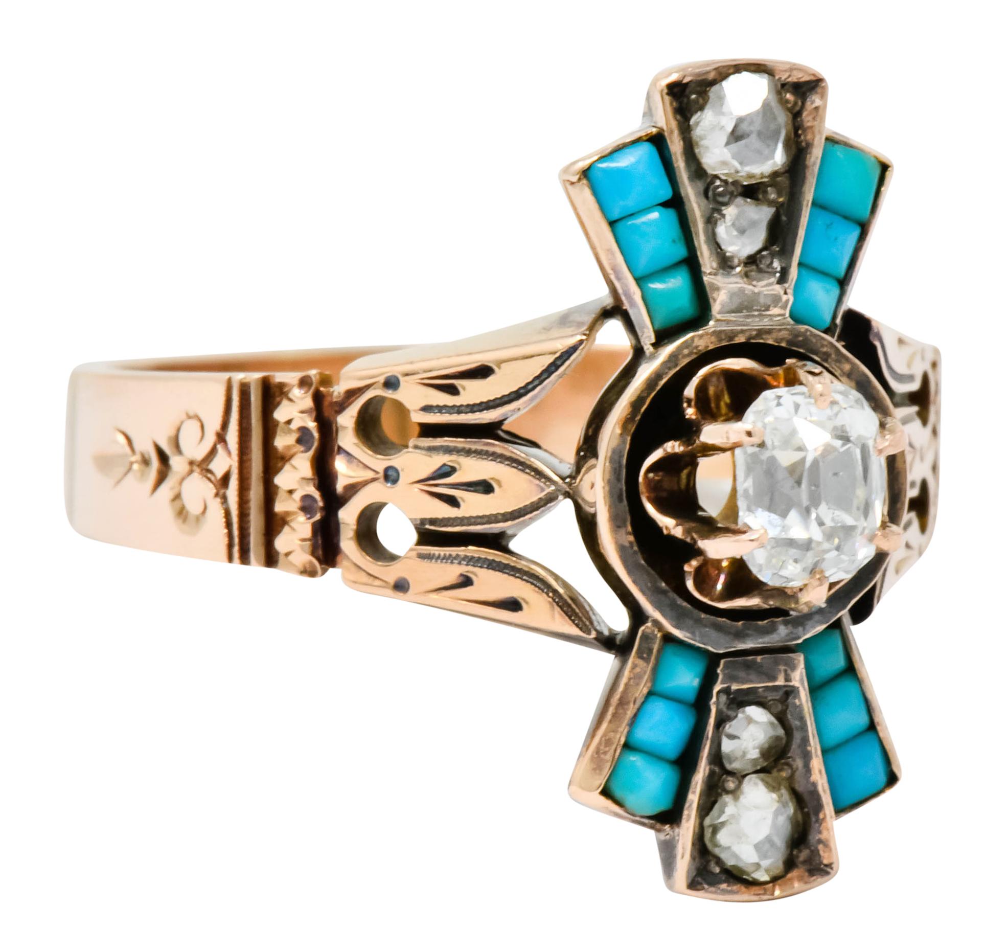 Designed as two sets of stepped rays, North and South, that features calibré cut turquoise; opaque and sky blue to greenish-blue in color

With rose cut accents weighing approximately 0.17 carat total

Ring centers a belcher set old mine cut diamond