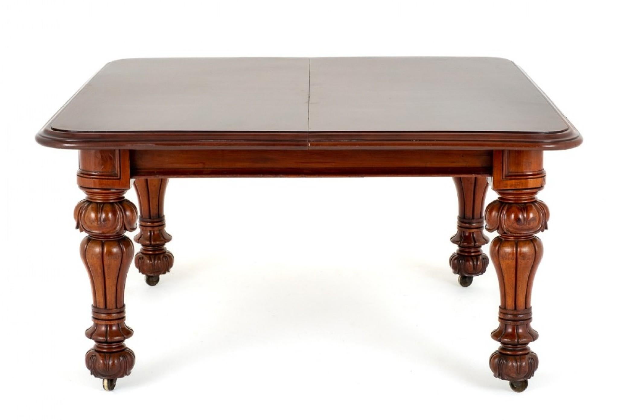 Good quality Victorian mahogany extending dining table.
circa 1860
Standing upon boldly carved and turned legs with brass castors.
The table extends by way of a pullout telescopic mechanism to accept up to 6 extra leaves.
The top of the table