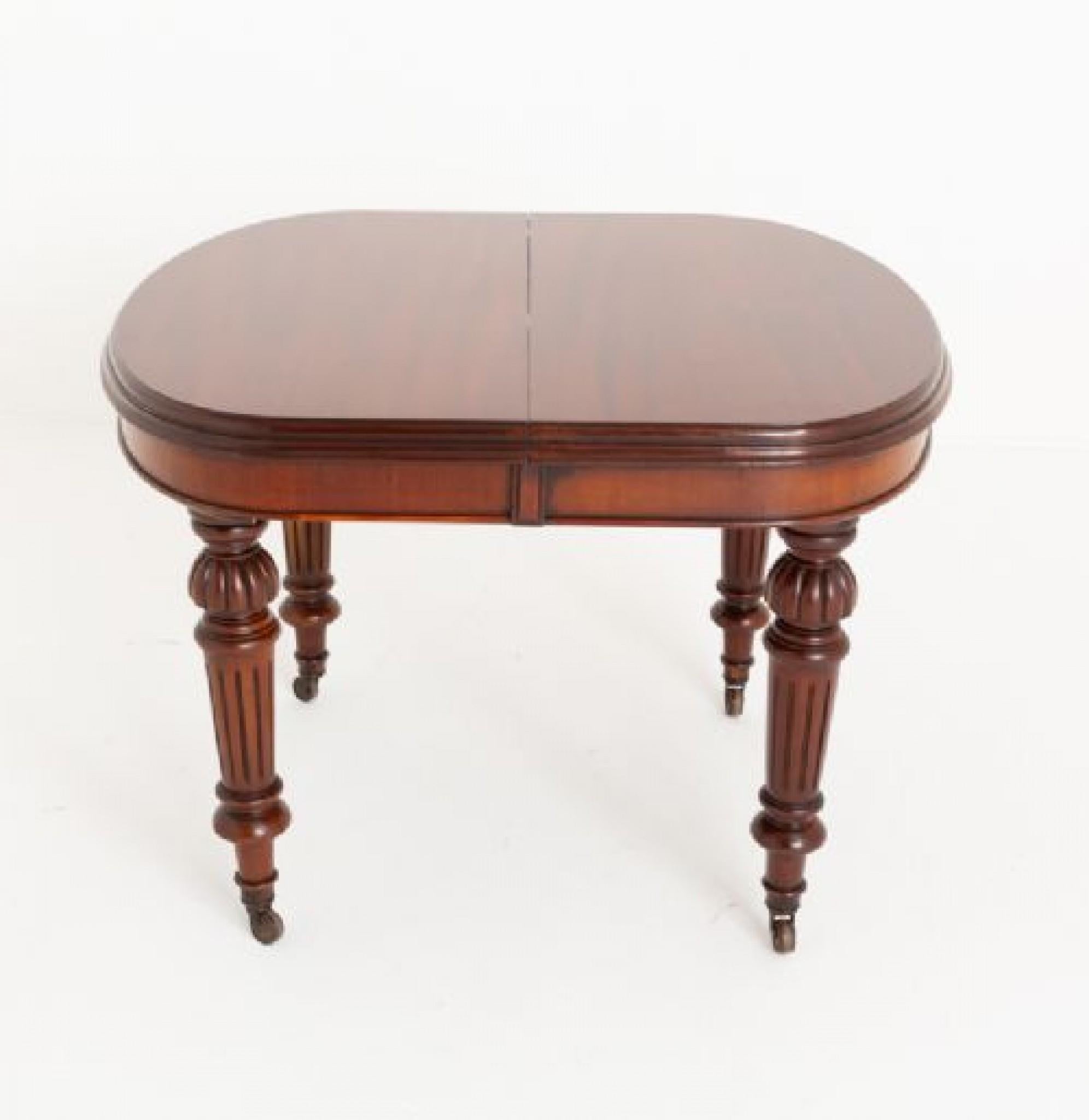 Victorian Mahogany 2 Leaf Extending Dining Table.
Will ship to anywhere in the world - please get in touch for a quote
This dining table is raised upon carved and turned legs with inverted flutes and original castors.
Circa 1860
The table is of a