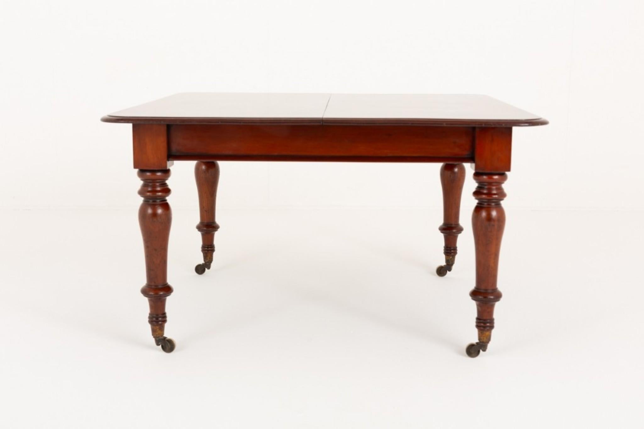 Victorian mahogany extending dining table.
Circa 1860
We can ship to anywhere in the world - including the US - so please get in touch for shipping quotes or any other questions
This dining table stands upon ring turned legs with original brass