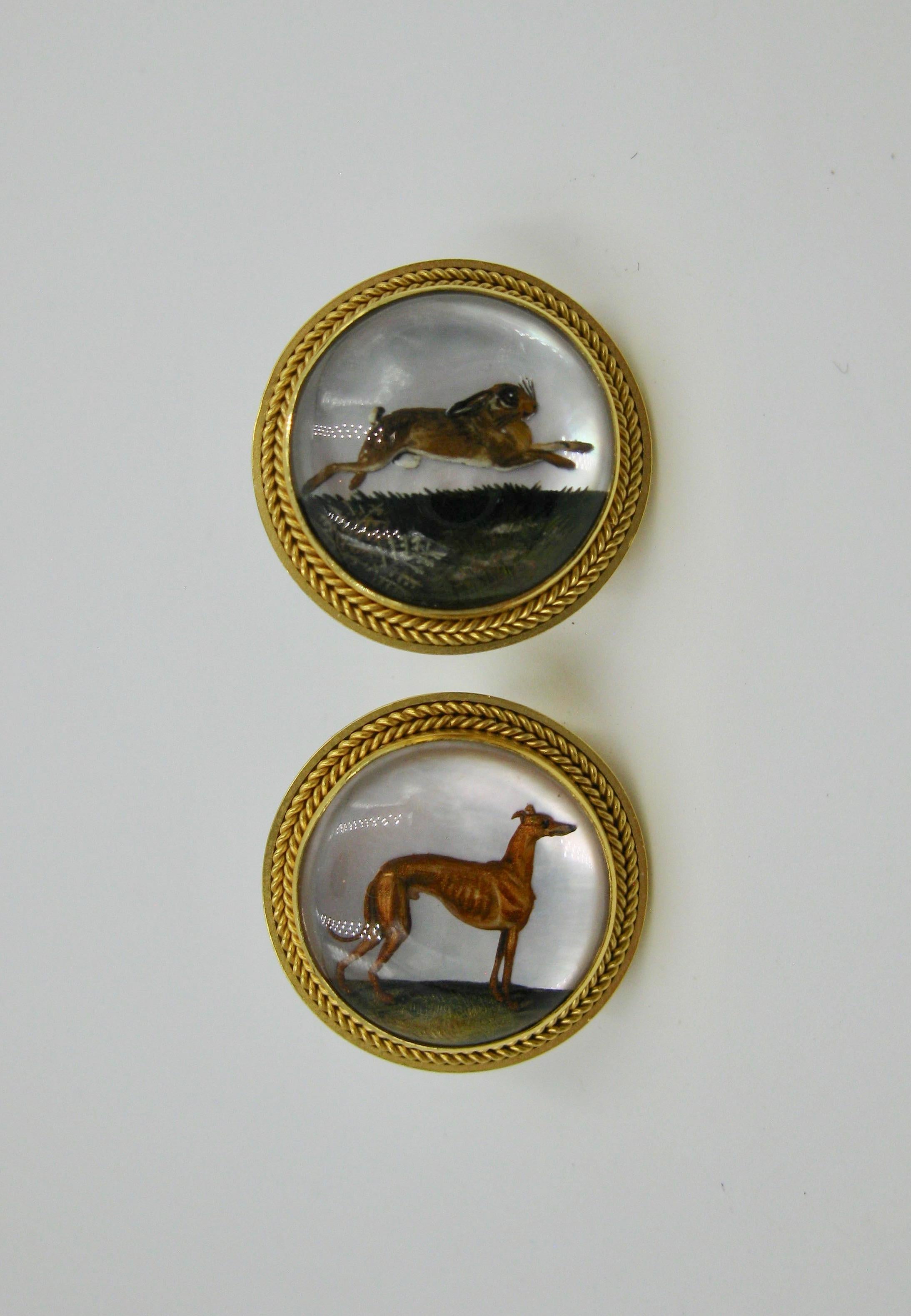 A gorgeous and very rare pair of large one inch Antique Victorian Etruscan Revival Essex Crystal Earrings with images of a dog and a rabbit, or hound and hare and set in 15 Karat Gold.  These are spectacular Museum Quality earrings.  The Essex