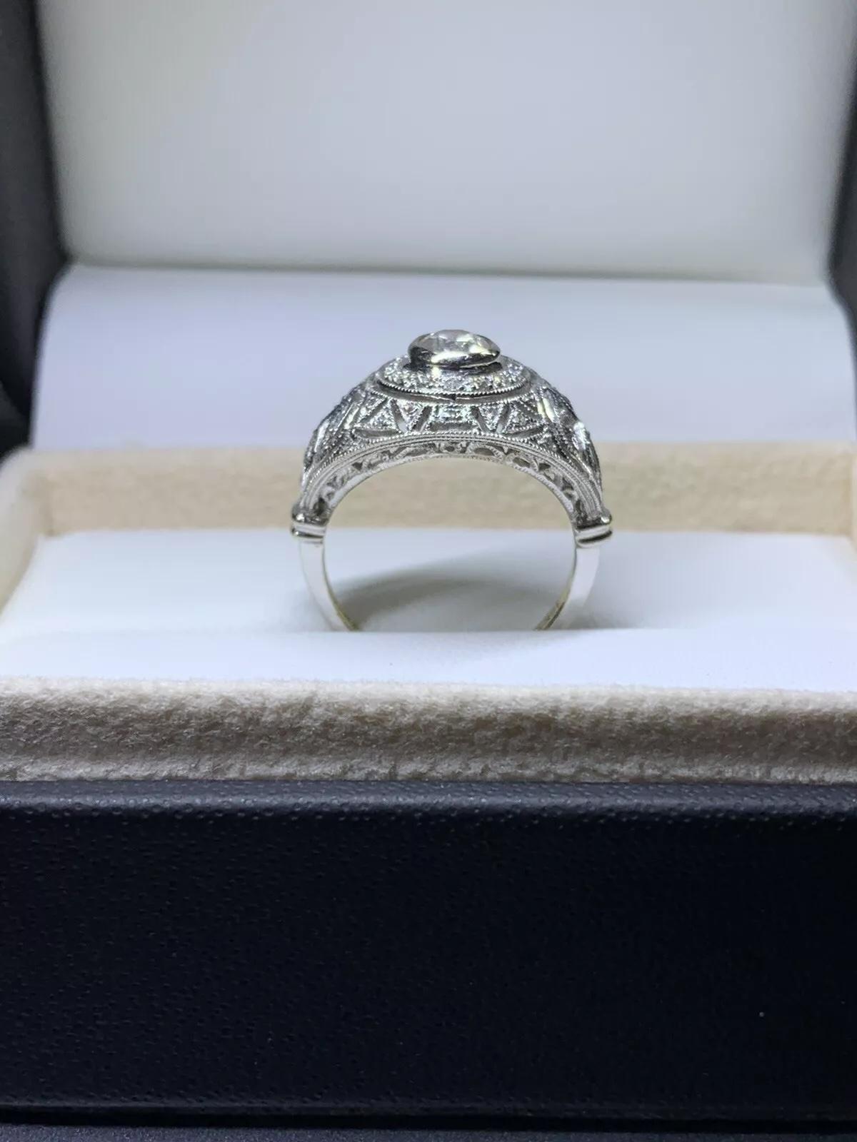 This exquisite Victorian dome chunky solitaire engagement ring will leave you breathless. Crafted from 18ct white gold, this ring showcases a natural, 0.86ct round diamond with a stunning F colour grade and very slightly included (VS1) clarity