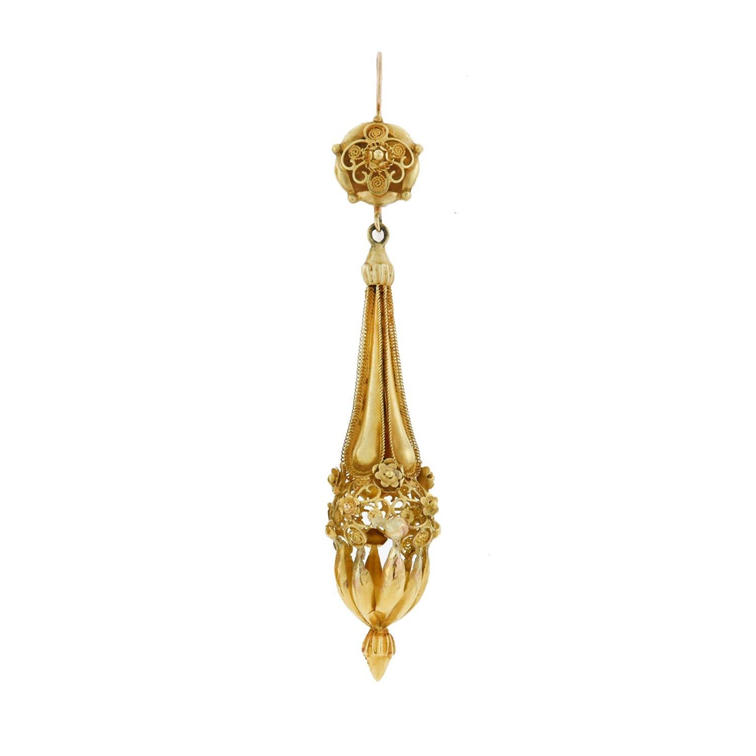 An exquisite pair of dramatic gold earrings from the Victorian (ca1880) era! These fantastic earrings are crafted in vibrant 18kt yellow gold and have an elongated torpedo style design. A long link hangs from a simple earring wire and decorative