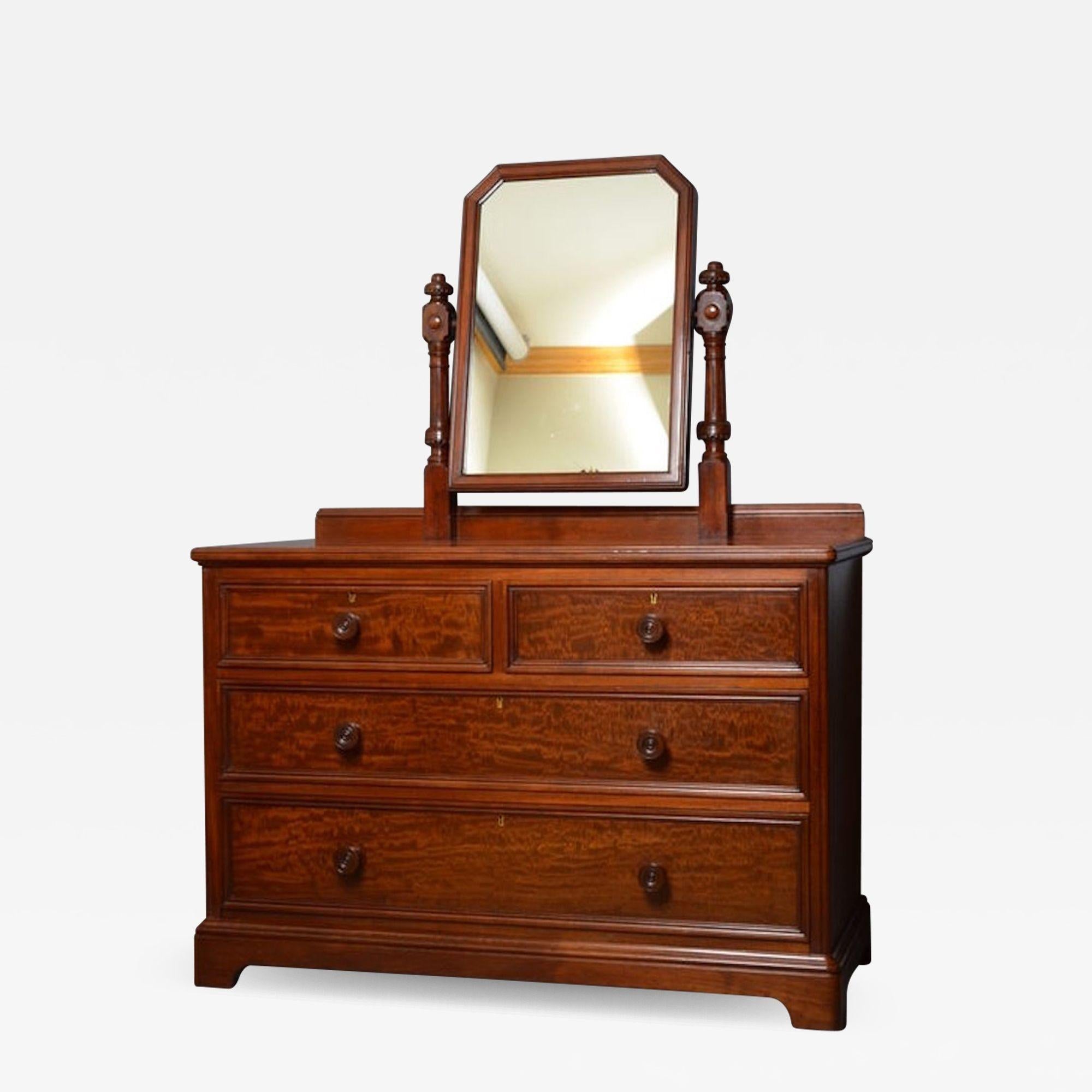Sn2637, superb quality and very attractive, Victorian, mahogany dressing chest of drawers in the manners of Gillows, having shaped mirror enclosed by fluted and carved uprights, figured mahogany, moulded top with 2 short and 2 long graduated and