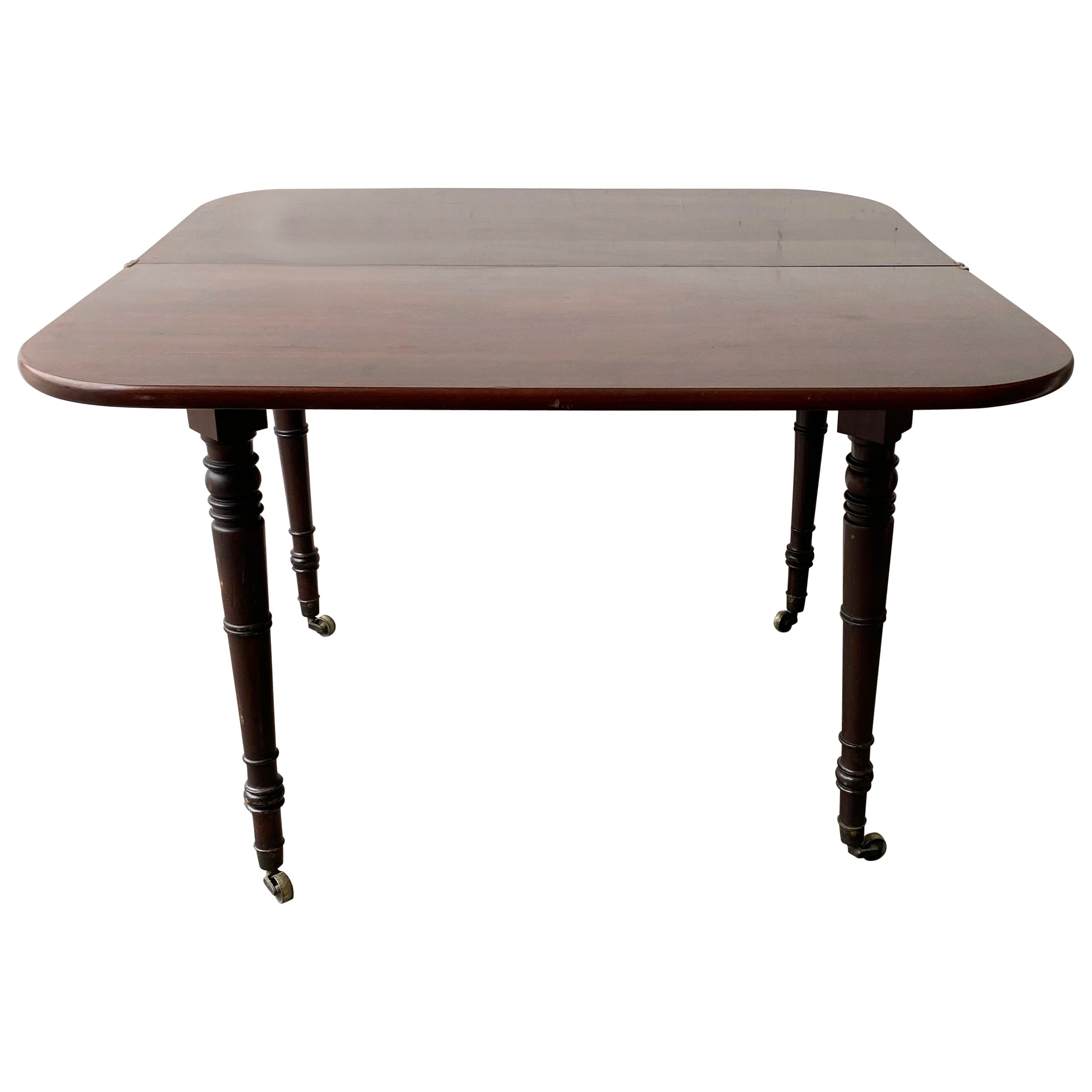Table de salle à manger à rallonge victorienne en acajou à feuilles tombantes en vente