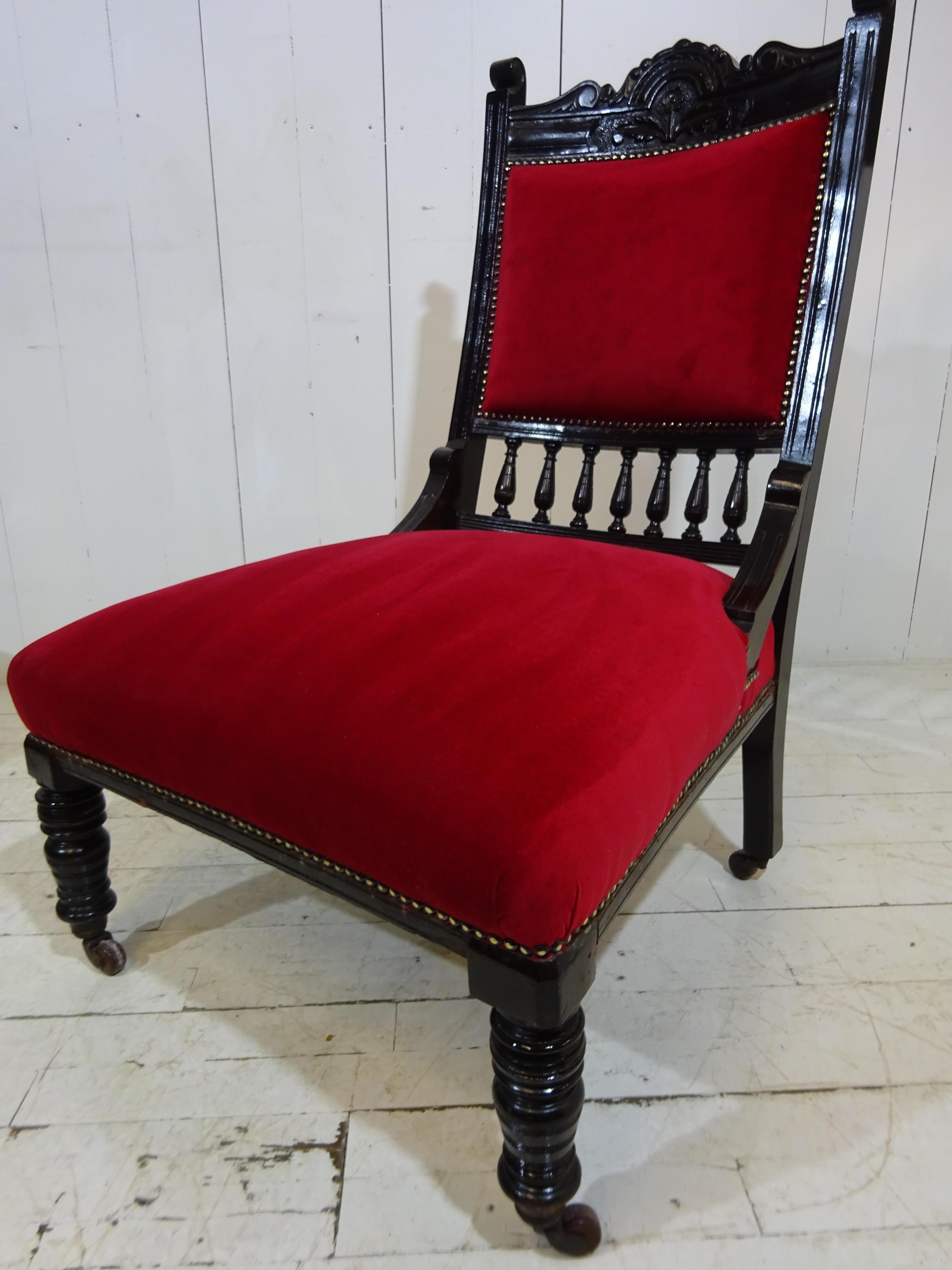 Victorian Side Chair 

A timeless and elegant addition to any room. 

This is a lovely Victorian ebonised side or bedroom chair. The chair frame is solid oak with delicate carved details throughout. The chair sits on the original brown ceramic