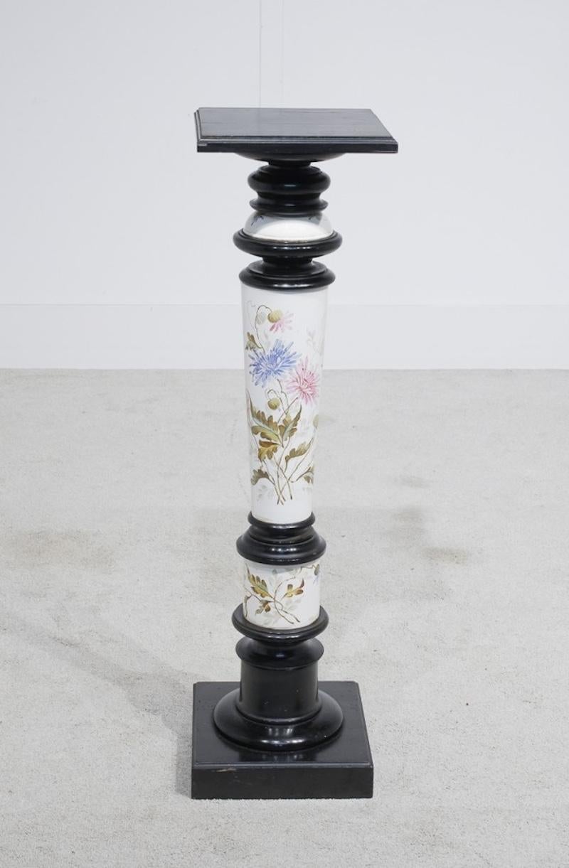 Eclectic Victorian porcelain and ebony pedestal stand
Ebony - or lacquered sections include the tops and base White porcelain sections finished with hand painted floral designs
Great interiors look, this would look great surmounted by a bust or