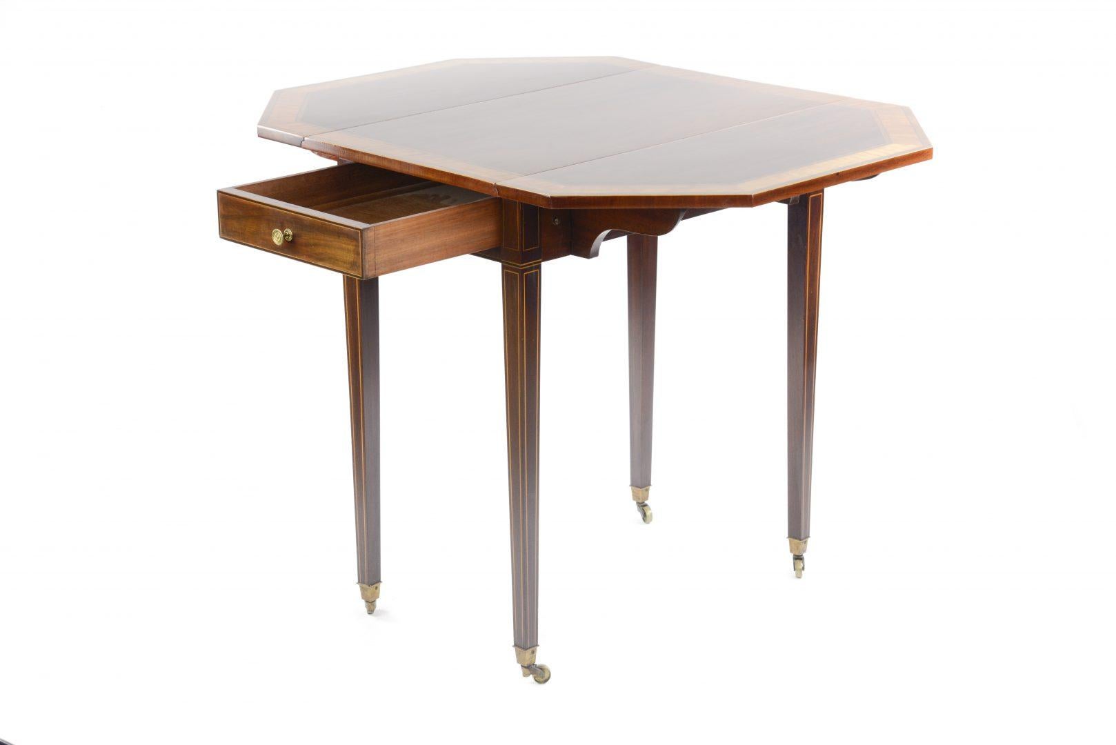 Victorian/Edwardian Sheraton style Pembroke table by Gillows Lancaster, crossbanded with satin, rosewood and ebony, single drawer with gilt brass knob, inlaid square taper legs with brass castors, the drawer stamped 'Gillows' & numbered 'L35946',