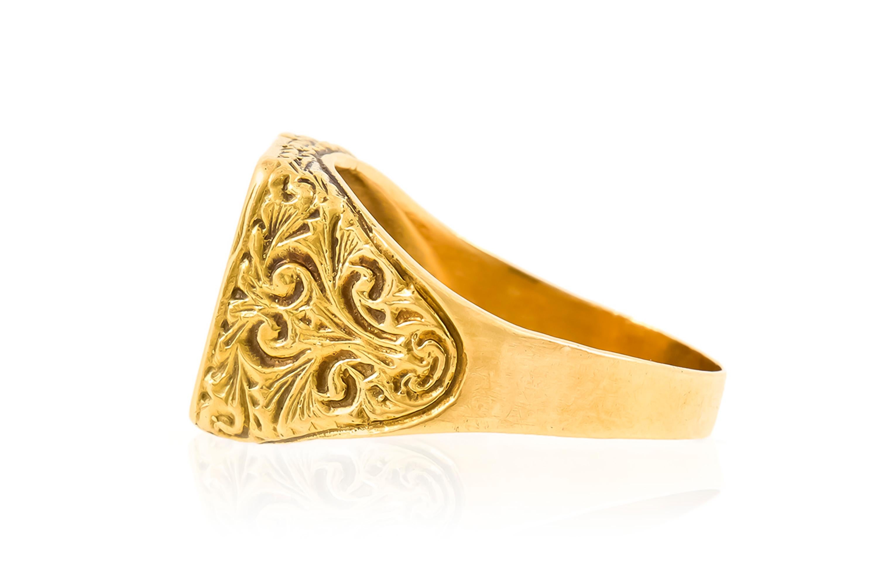 Finely crafted in 18k yellow gold and Blue Enamel.
The ring features a decorative egg design in the center and filigree on the sides.
Size 12 1/2, resizable
Victorian