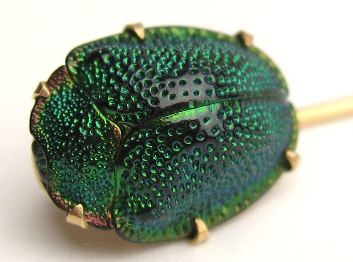 Victorian Egyptian Scarab Beetle Brooch Stick. Stunning Iridescent Green beetle scarab on this gold stick pin. 14K Gold. Measuring 2.54 in. top to bottom. Scarab measures .46 in. x .56 in. Please be sure to check our storefront for more jewelry as