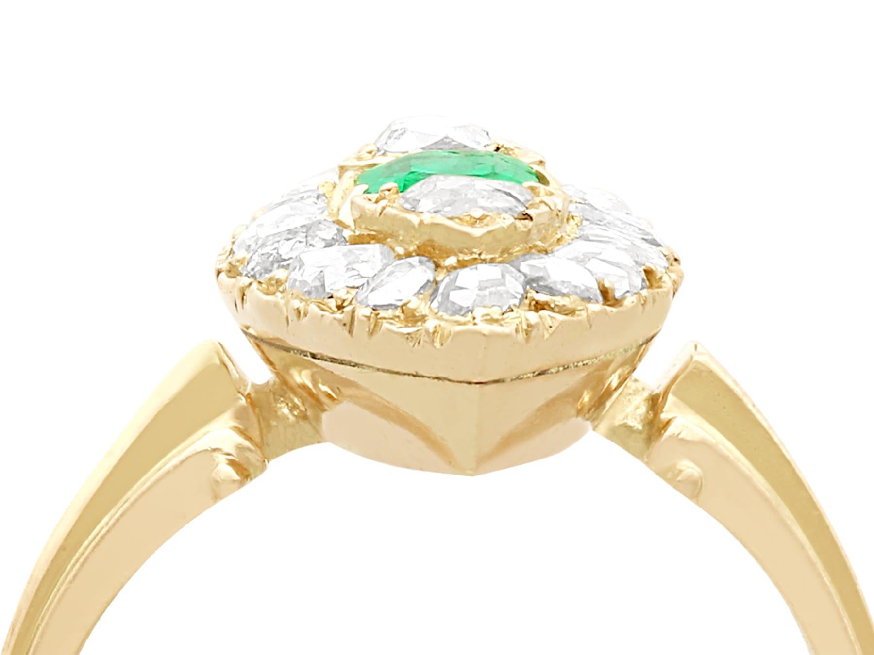 An exceptional antique 0.42 Ct emerald and 1.78 Ct diamond, 9k yellow gold marquise ring; part of our diverse antique Victorian jewelry collections.

This exceptional, fine and impressive marquise shaped emerald cut emerald and diamond ring has been