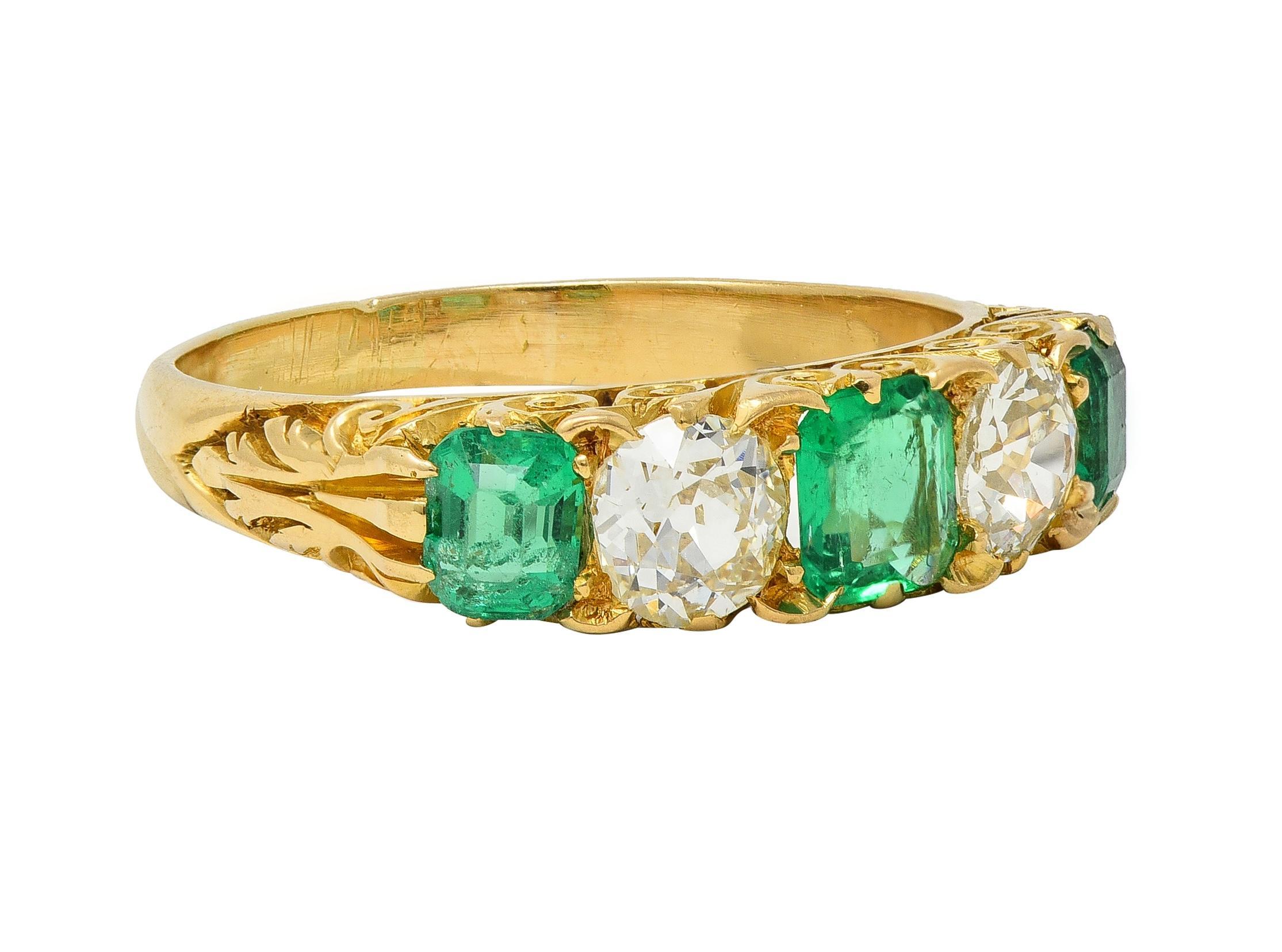 Featuring three emerald cut emeralds weighing approximately 1.44 carats total
Transparent medium green and alternating with old European cut diamonds 
Weighing approximately 0.74 carat total - G color with VS2 clarity
Prong set with a deeply grooved