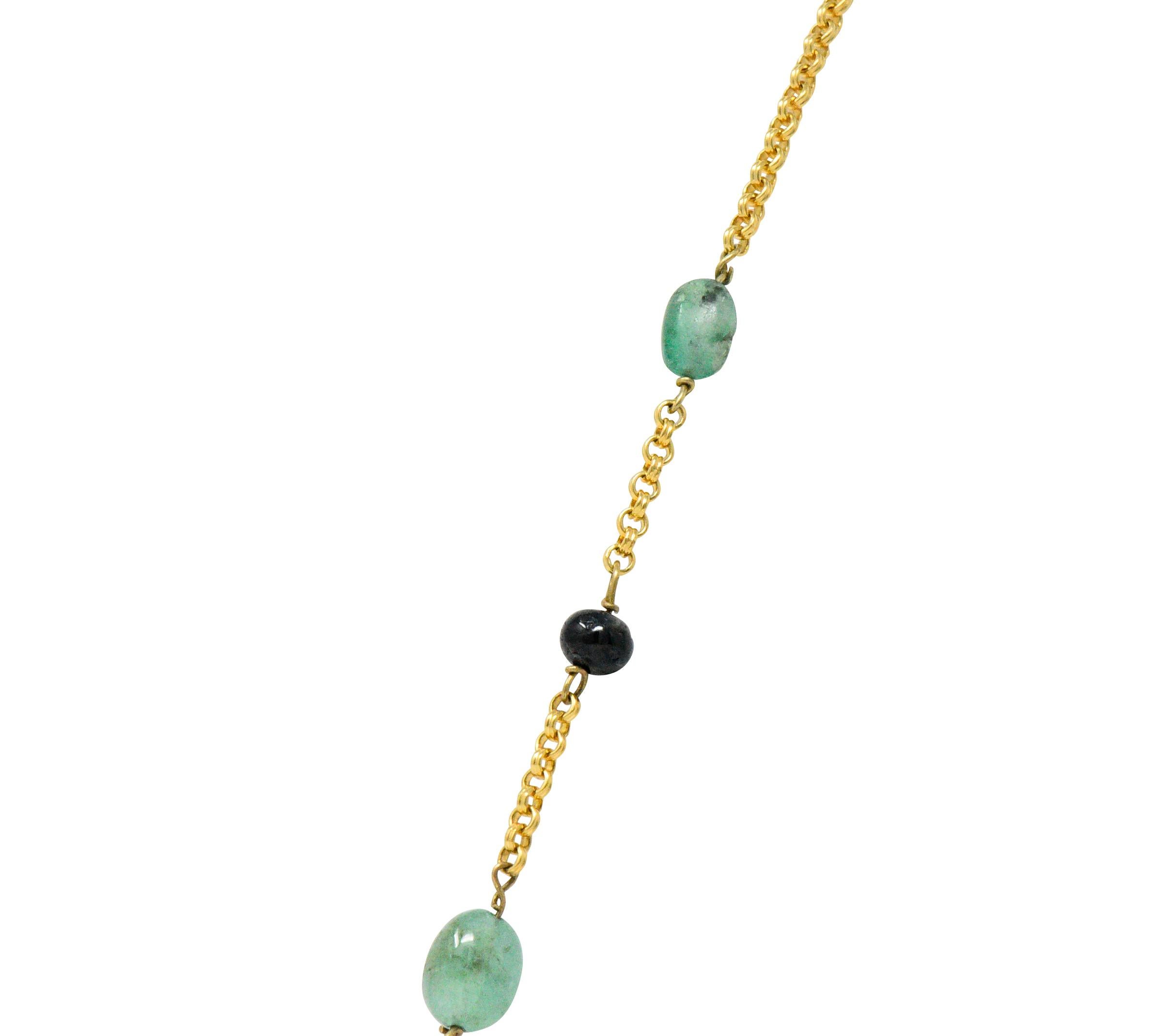 Rolo style chain featuring seven tumbled emeralds, four round sapphire beads, and two ruby beads

Each are naturally included with emerald a medium-light sea green, dark blueberry sapphires, and dark violetish-red ruby

Completed by a spring ring