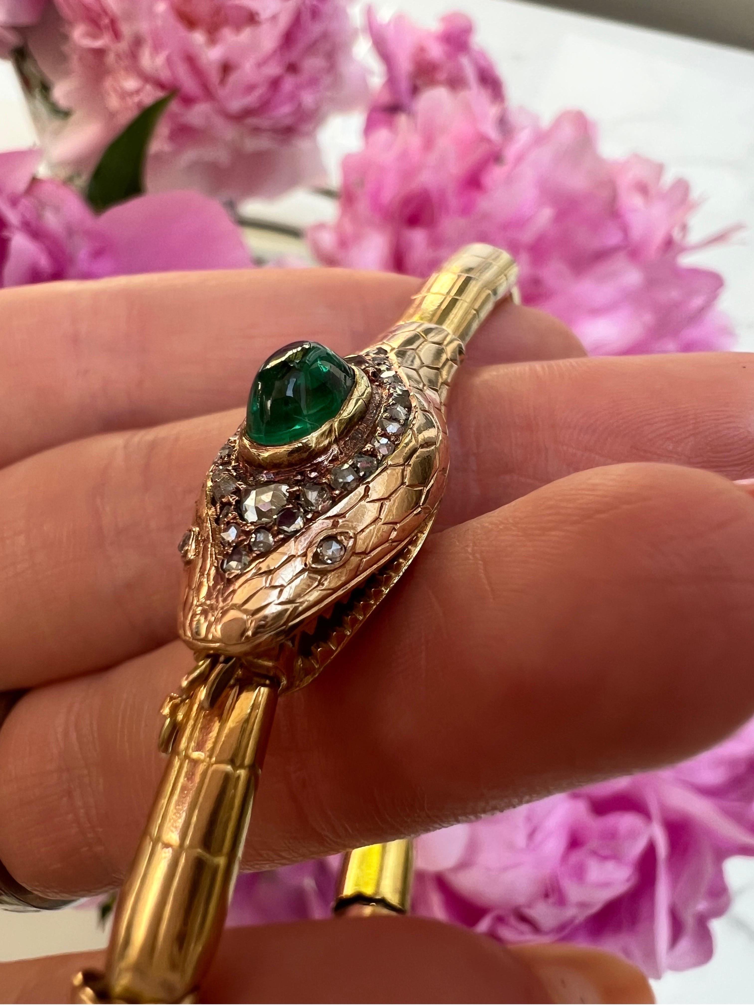 Antique Victorian (c1900) Cabochon Emerald and Diamond Snake Bracelet. In excellent condition. Oval cabochon emerald is Approx 1.5cts surrounded by rose cut diamonds, all set in 18ct gold, measures 8.5’’. 