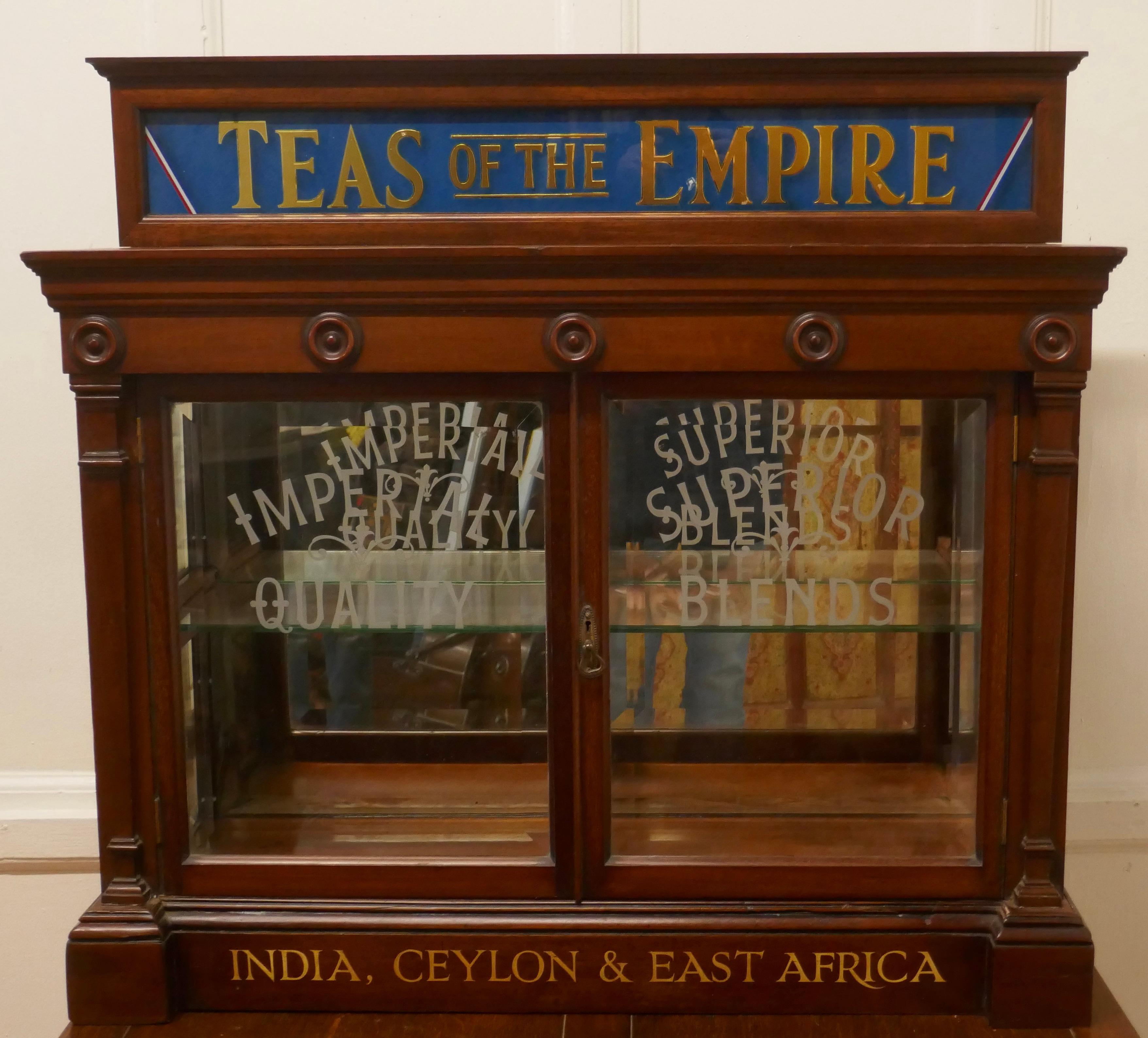  Victorian Empire Tea Cabinet, Tea Room, Cafe Display

A magnificent piece of social history a Victorian Grocers shop cupboard, with a blue mirror cornice and Gold Leaf writing advertising Teas of the Empire
The cupboard can be either wall hung or