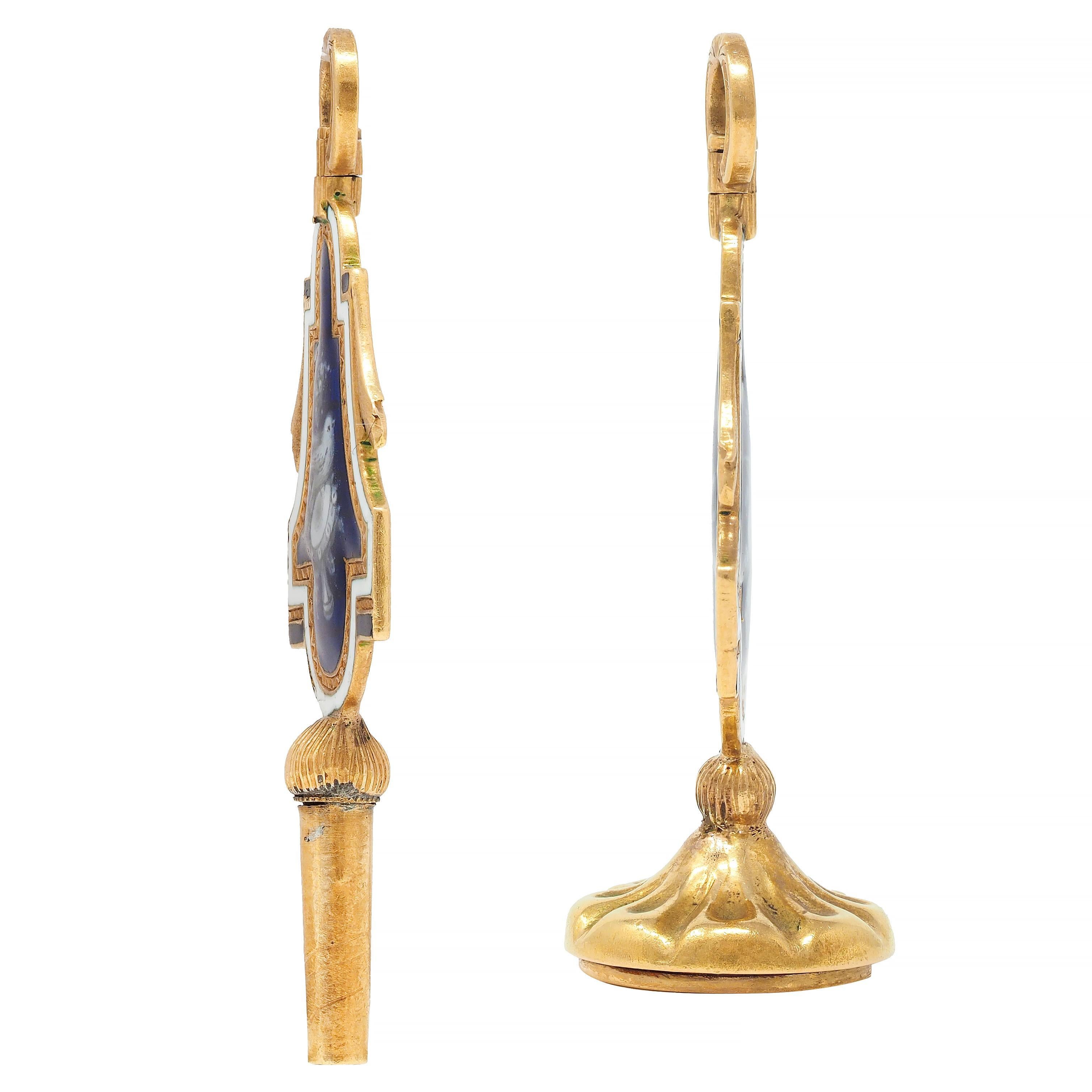 Designed as two matching fob pendants with cartouche-shaped forms centering painted enamel portraits
Depicting birds with foliates perched atop a lady's ribboned hat on one side and a lyre on the other
Opaque cobalt blue and white with engraved