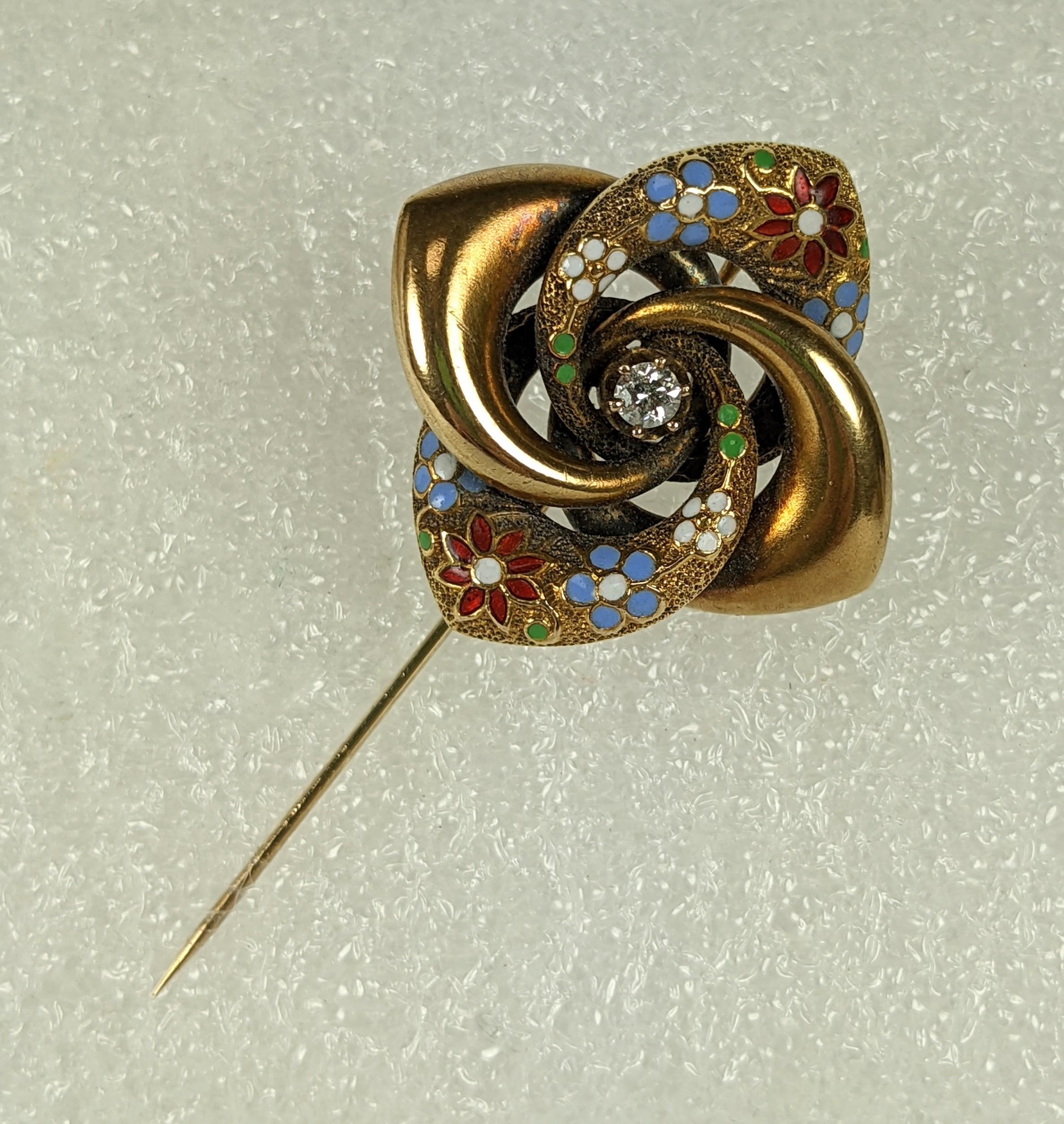 Large Victorian Enamel and Diamond Pinwheel Stickpin in 14k from the late 19th Century. Originally a brooch but converted to a stickpin later. Finely enameled in red, blue and white florals. 1870 USA. 1.25