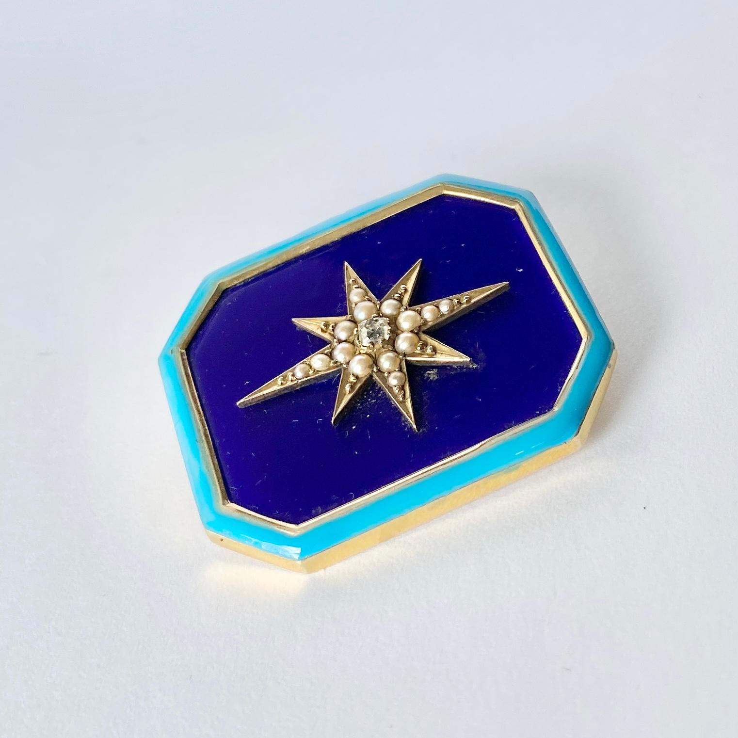 This 9ct gold brooch has a wonderful bright blue enamel on the face of it.  At the centre of the brooch there is a small sparkling diamond measuring 10pts and around it is a starburst of pearls. Comes in original box.

Dimensions: 37x32mm

Weight: