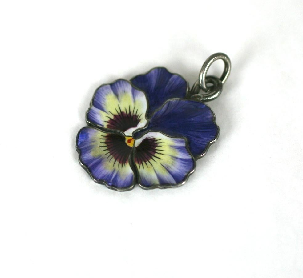 Lovely Victorian Enamel Pansy Pendant from the late 1800's. Set in 900 silver with original pendant loop.
Likely German in manufacture. 1.75