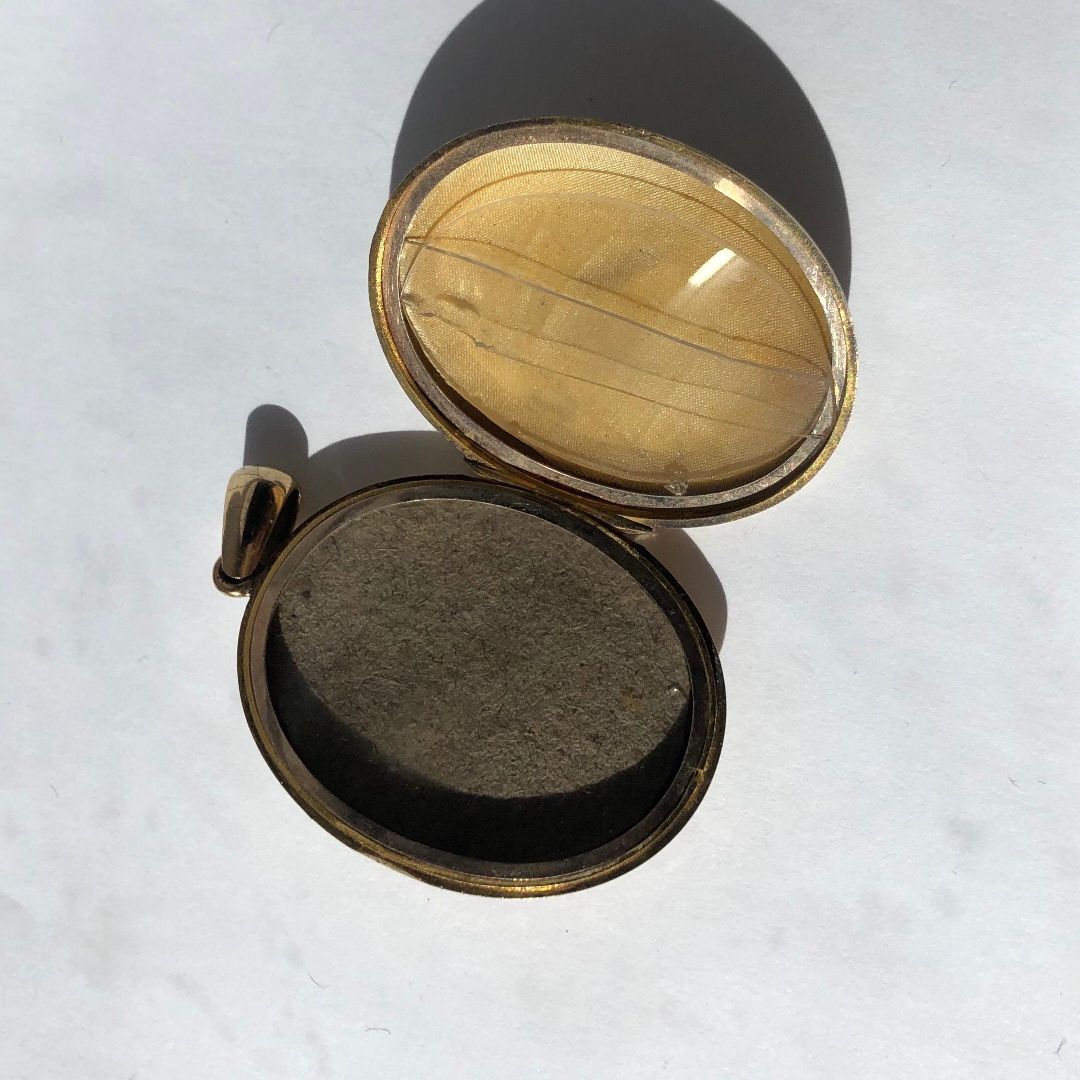 Uncut Victorian Enamel, Pearl and 15 Carat Gold Locket