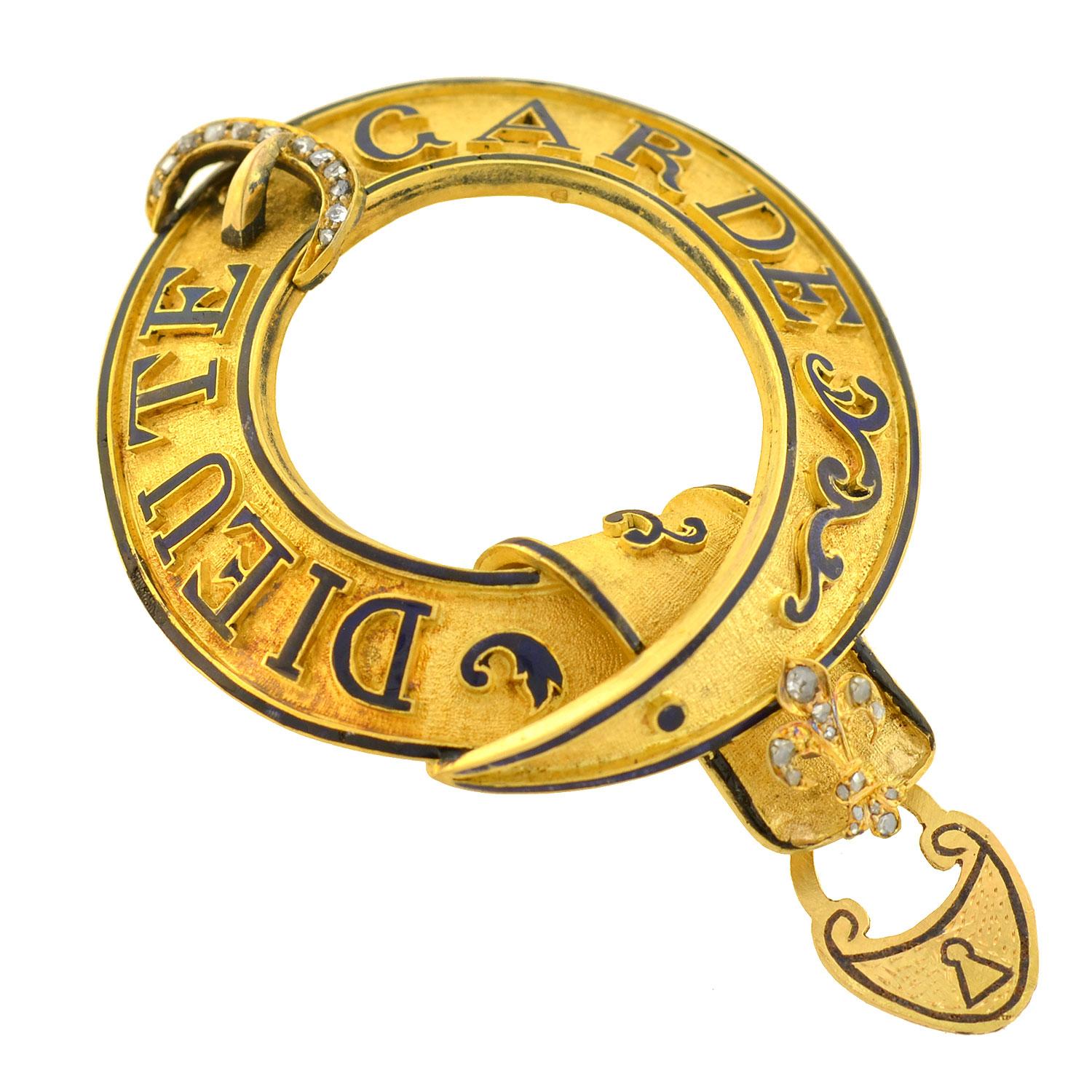 A stunning and unique pendant from the Victorian (ca1880) era! Crafted in rich 18kt yellow gold, this gorgeous piece, which is particularly large in size, forms a three-dimensional loop which is portrayed by the strap of a belt. Lining the surface