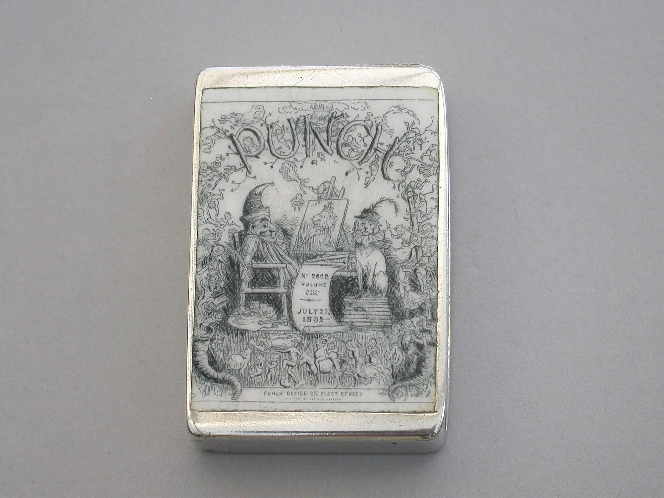 A good Victorian silver and enamel Vesta case of rounded rectangular form with hinged lid and silver gilt interior. The cover inset with a monochrome enamel panel depicting the front cover of Punch Magazine dated 1892.

By John Millward Banks,