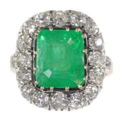 Victorian Engagement Ring with Brilliant Cut Diamond and Large Certified Emerald