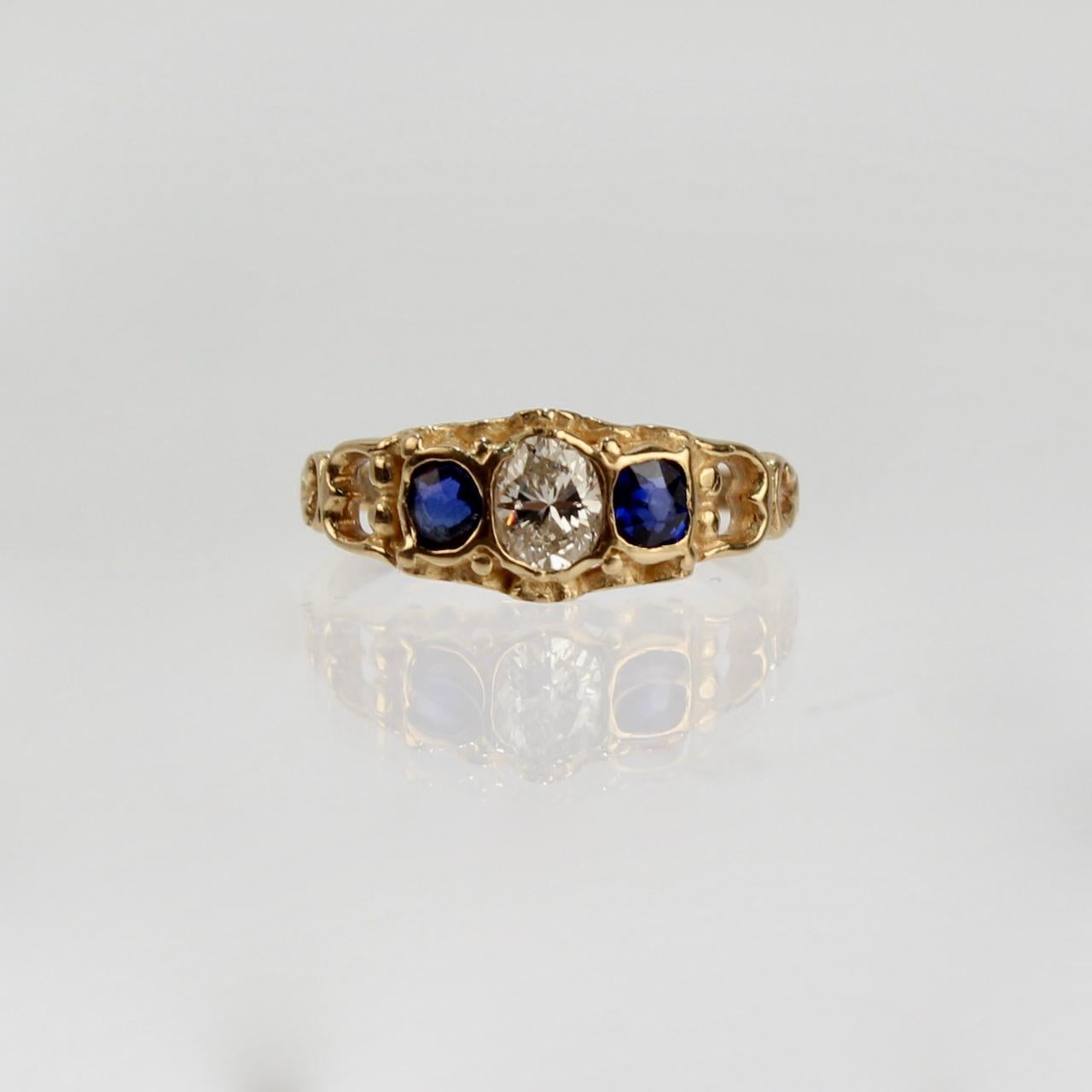Oval Cut Antique English 18 Karat Gold, Sapphire, and Diamond Ring