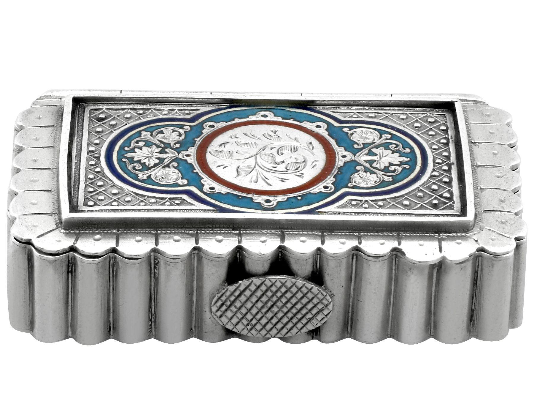 An exceptional, fine and impressive, unusual antique Victorian English sterling silver and enamel vesta box, an addition to our silver boxes collection.

This exceptional and unusual antique Victorian sterling silver vesta box has a rectangular,