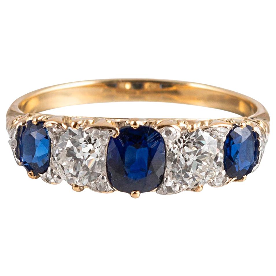 Victorian English Carved Sapphire and Diamond Ring