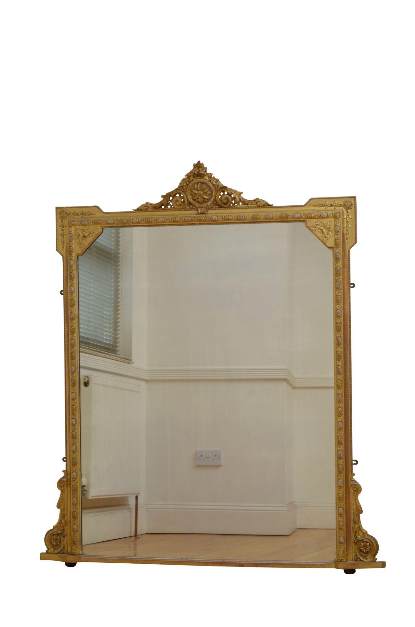 K0609  Superb Victorian giltwood overmantel mirror, having original mirror plate with air bubbles and minor imperfections in gilded and moulded, carved and beaded frame with floral scrolls to the base, projecting floral corners and lattice work