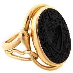 Anello vittoriano inglese con stemma calcografico e serpente in oro 15 carati