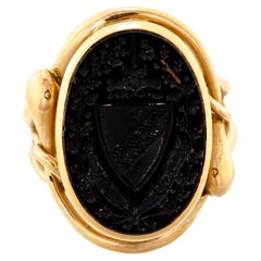 Signet anglais victorien en forme de crête en creux et bague serpent en or 15 carats