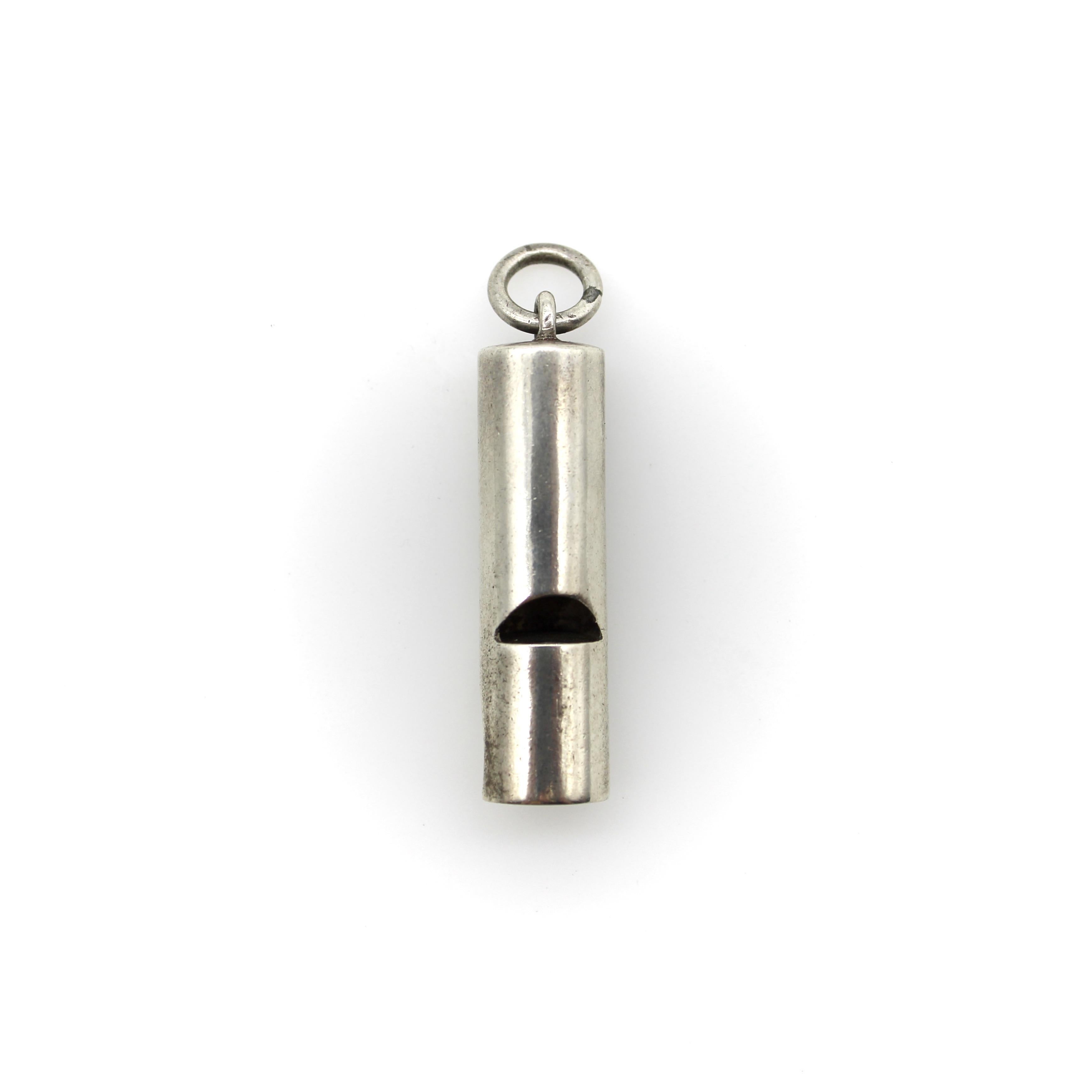 We found this sterling silver whistle, circa 1876, on a recent trip to London. We love functional jewelry, and this is a sweet example of a dog whistle from the Victorian era. It has a cylindrical form with a half-moon cut out where air escapes the