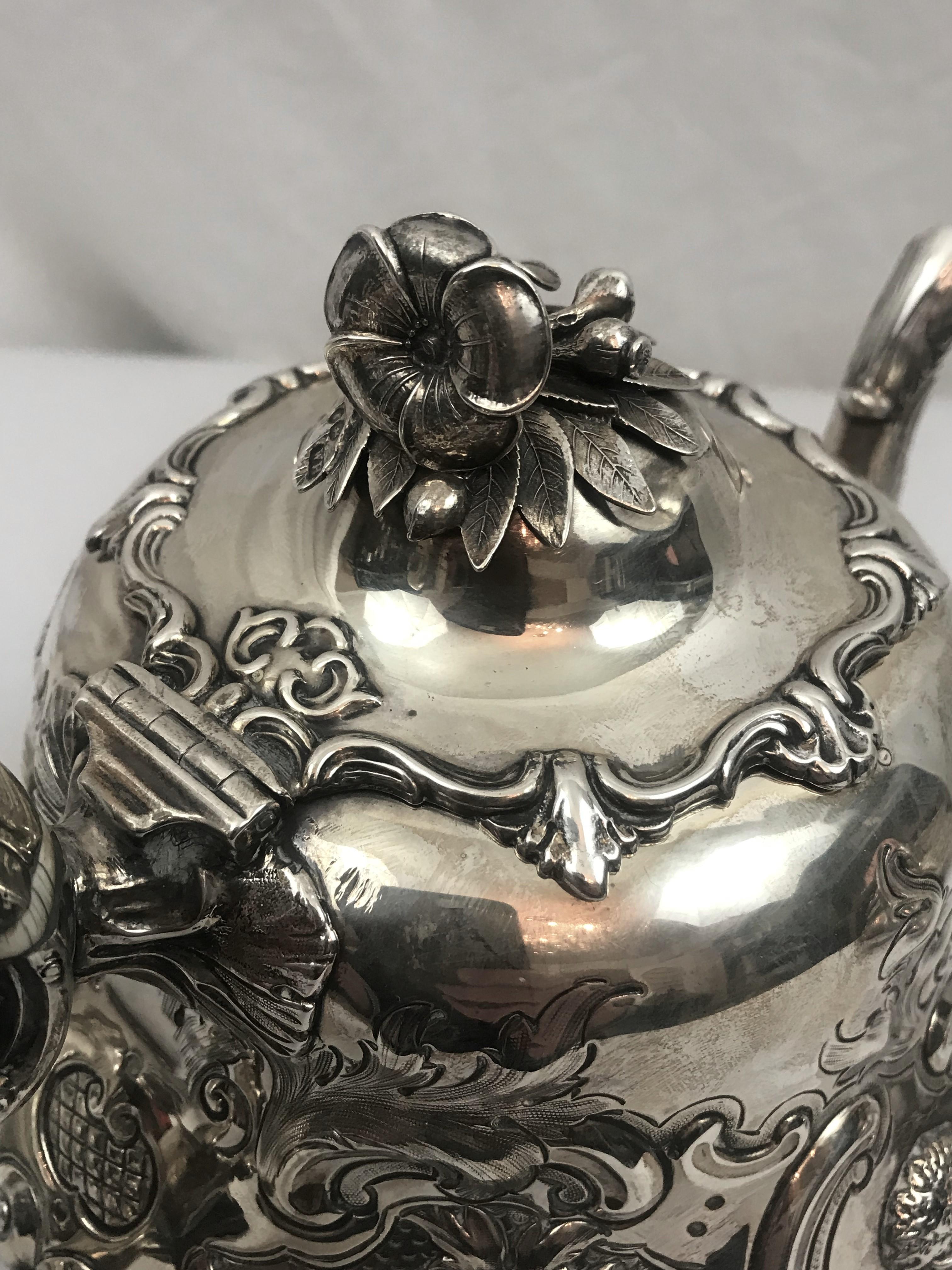 High Victorian Victorian English Sterling Silver Repousse Teapot, London 1855, William Hunter