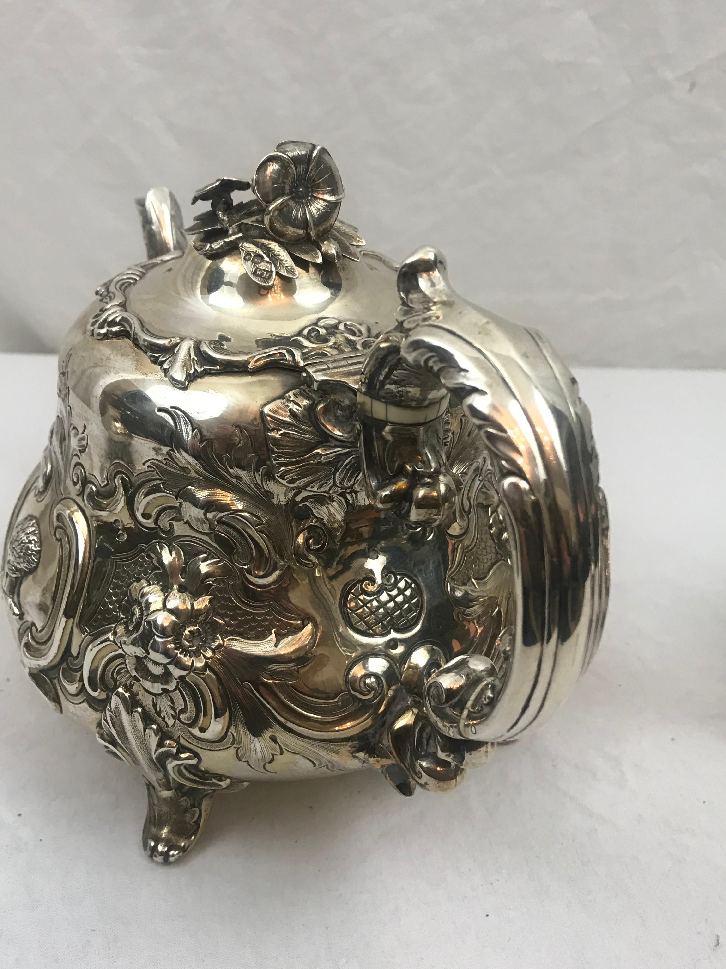 British Victorian English Sterling Silver Repousse Teapot, London 1855, William Hunter