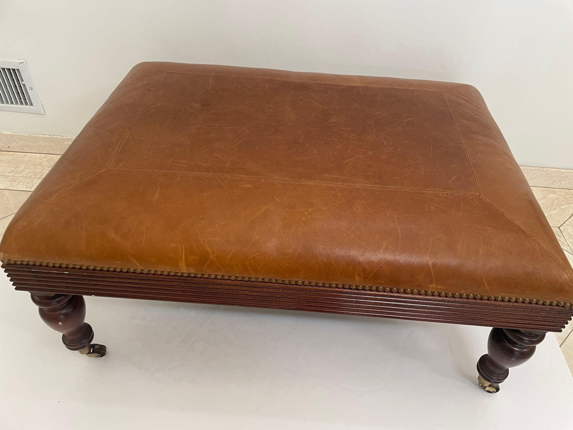 Victorian English Style leather Ottoman with Brass Casters and Nailhead Trim For Sale 8