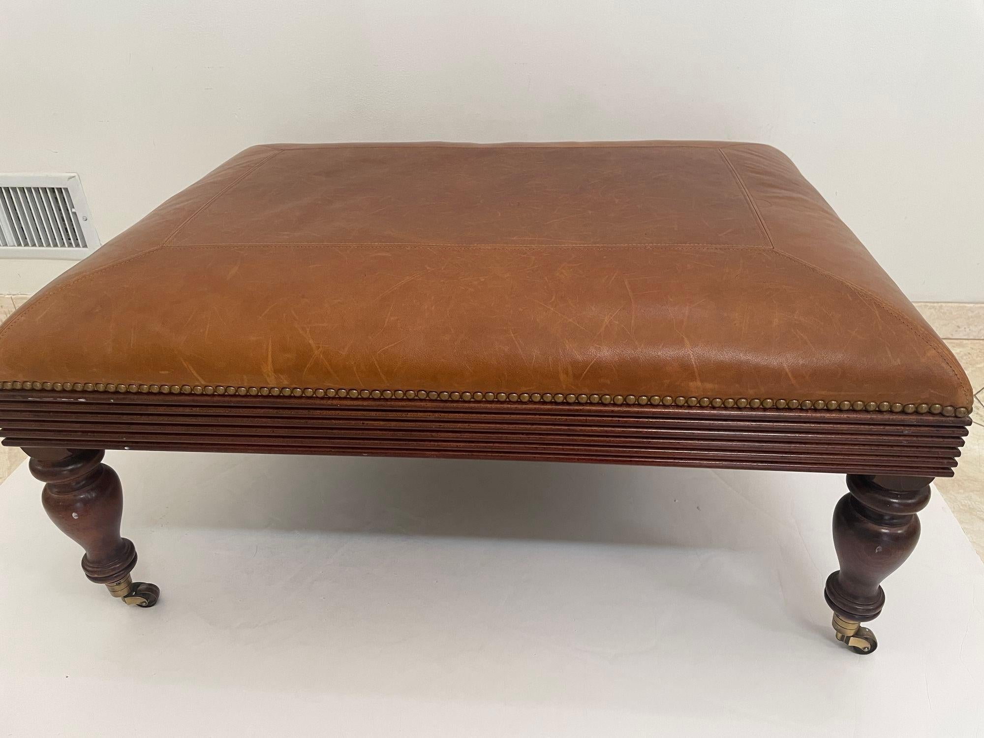 Victorian English Style leather Ottoman with Brass Casters and Nailhead Trim For Sale 9