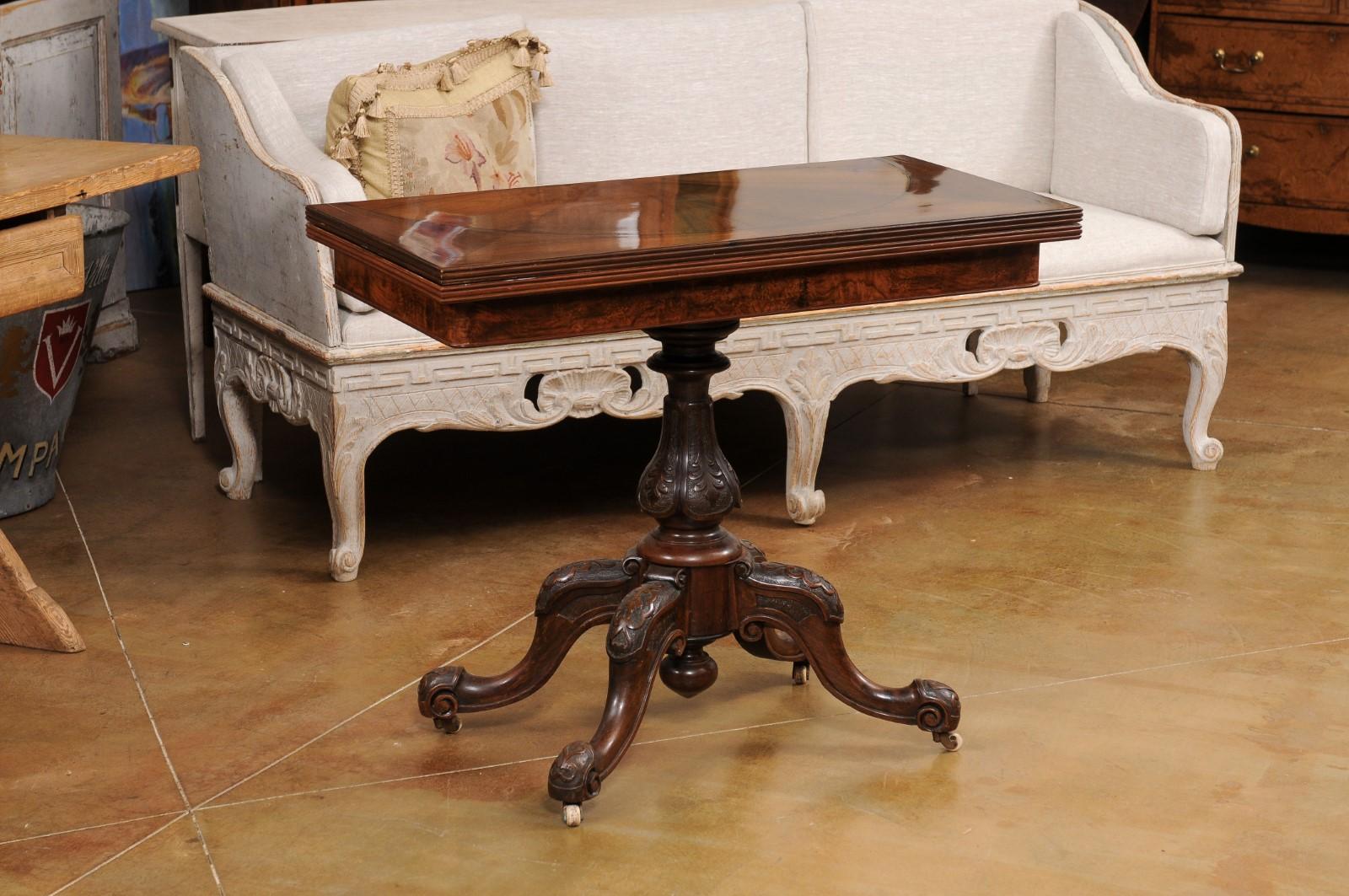 Carved Victorian English Walnut and Mahogany Fold-Over Game Table with Bookmatched Top For Sale