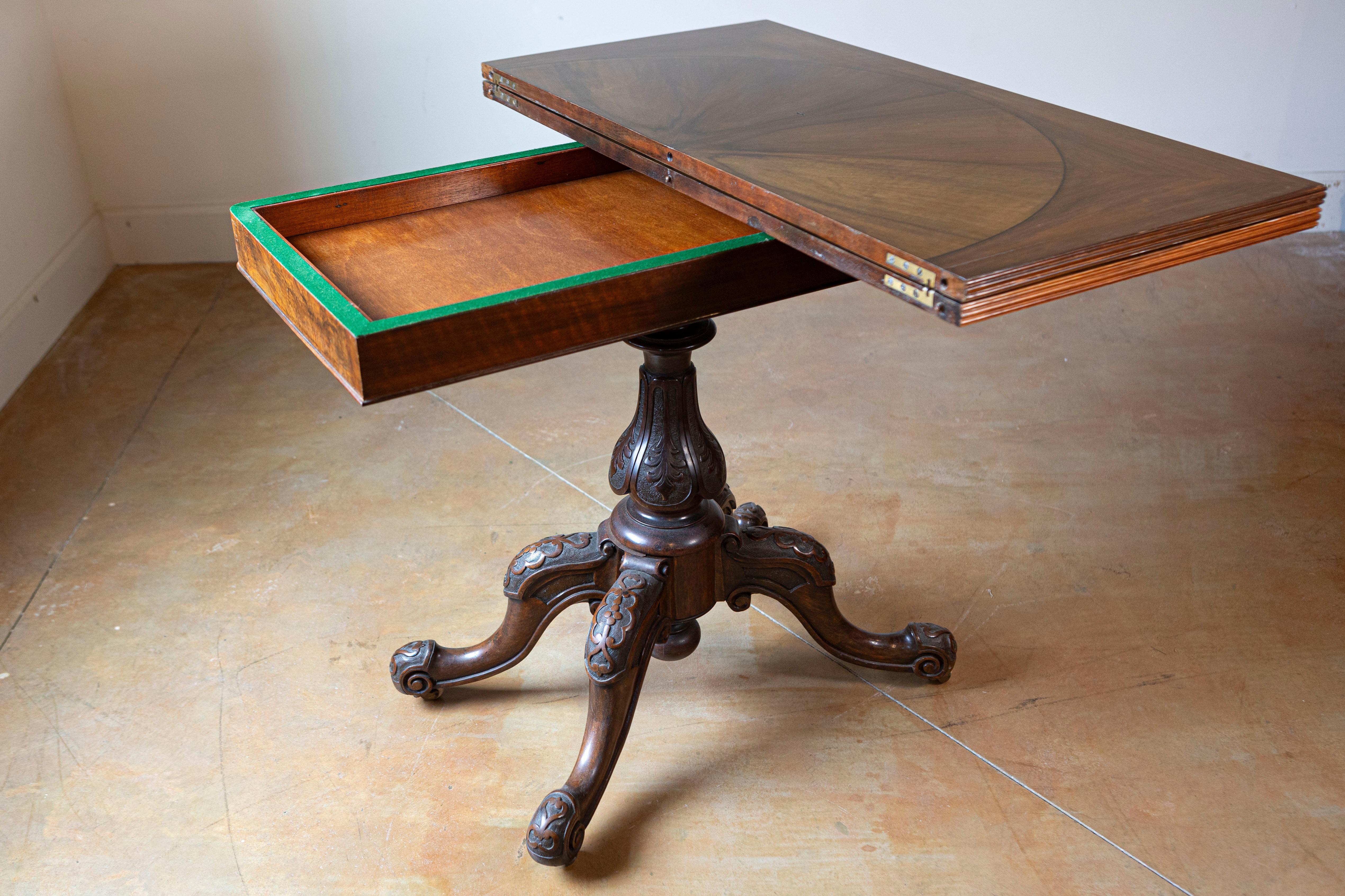 Carved Victorian English Walnut and Mahogany Fold-Over Game Table with Bookmatched Top For Sale
