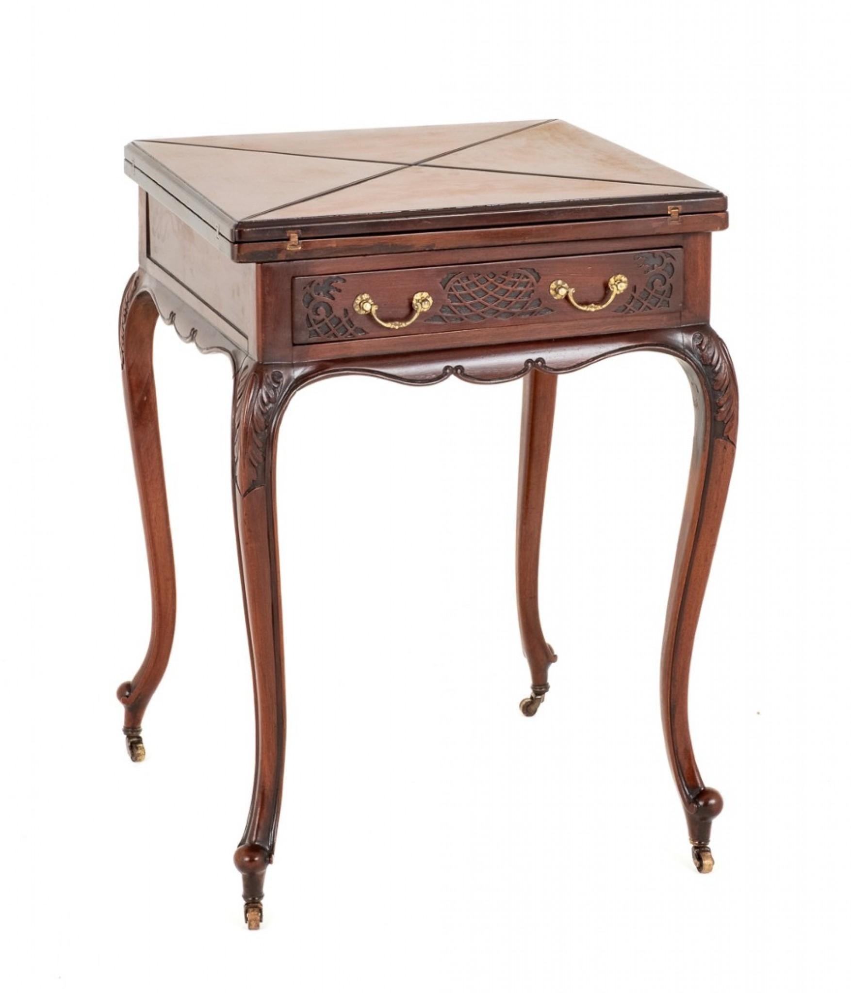 Pretty Late Victorian Mahogany Envelope Card Table.
This Table Stands upon Shaped Legs with Carved Toes and Brass Castors.
Circa 1890
The Knees of the Legs Having Carved Decoration.
The Card Table Features 1 Mahogany Lined Drawer with Fret work and
