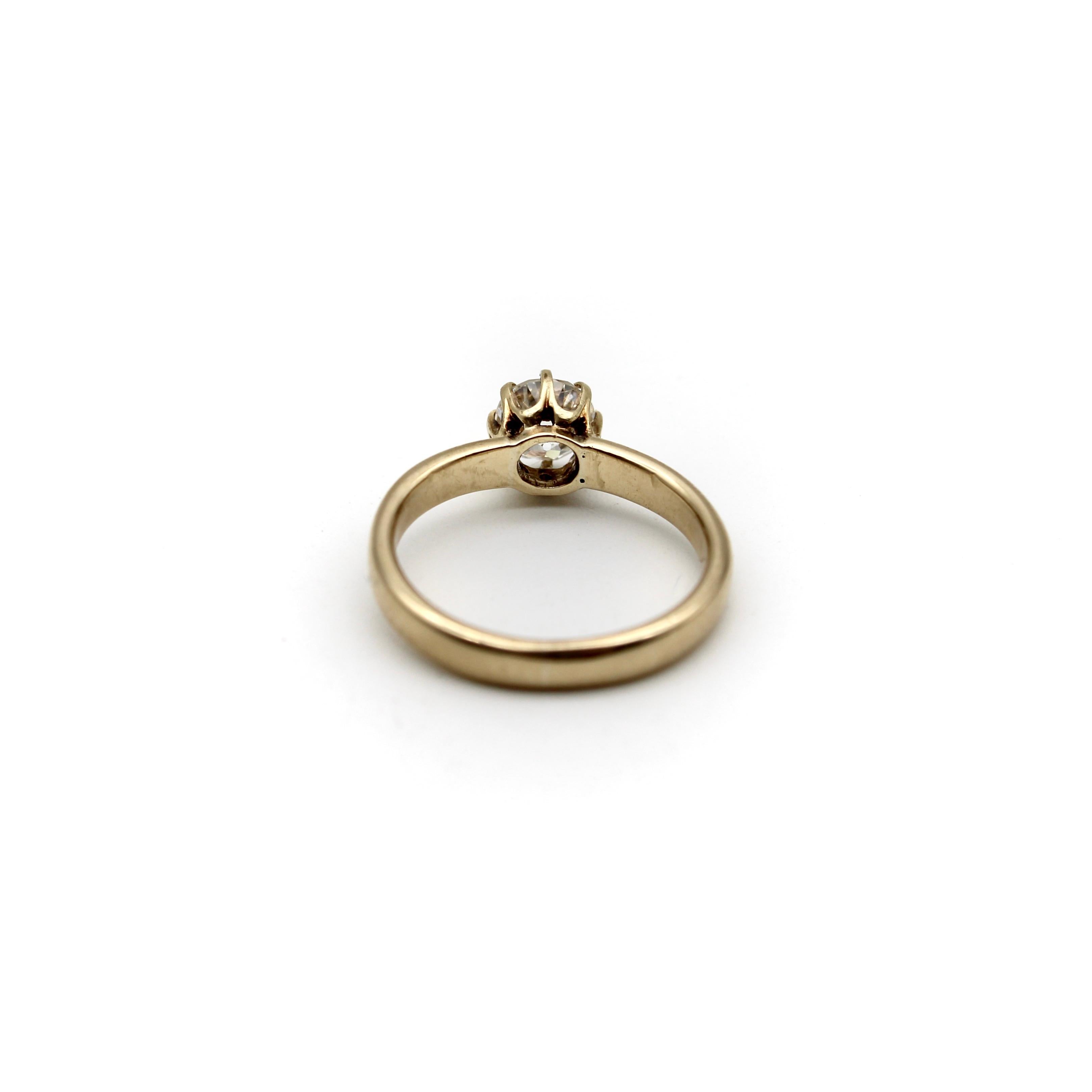 An original engagement ring from the Victorian period, this 14k gold Old European Cut diamond ring dates to about 1890. The diamond is set in an elegant basket, with eight prongs holding the stone in place. Stunning in its simplicity, this ring is
