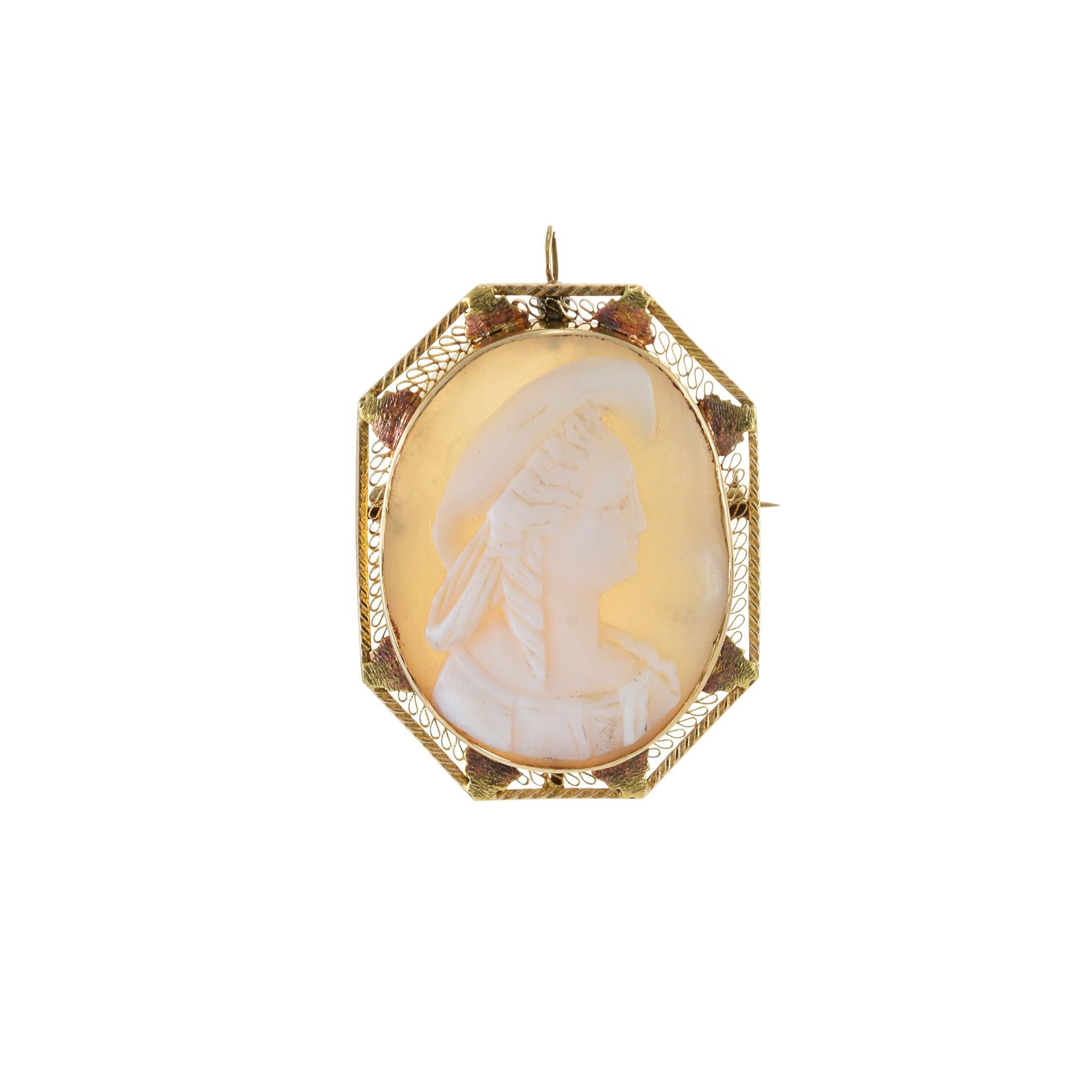 This pendant features detailed hand-carved designs on lustrous yellow gold, showcasing the timeless beauty and craftsmanship of 14KT gold. Crafted using only the finest materials and expertly executed techniques, this estate piece is sure to become