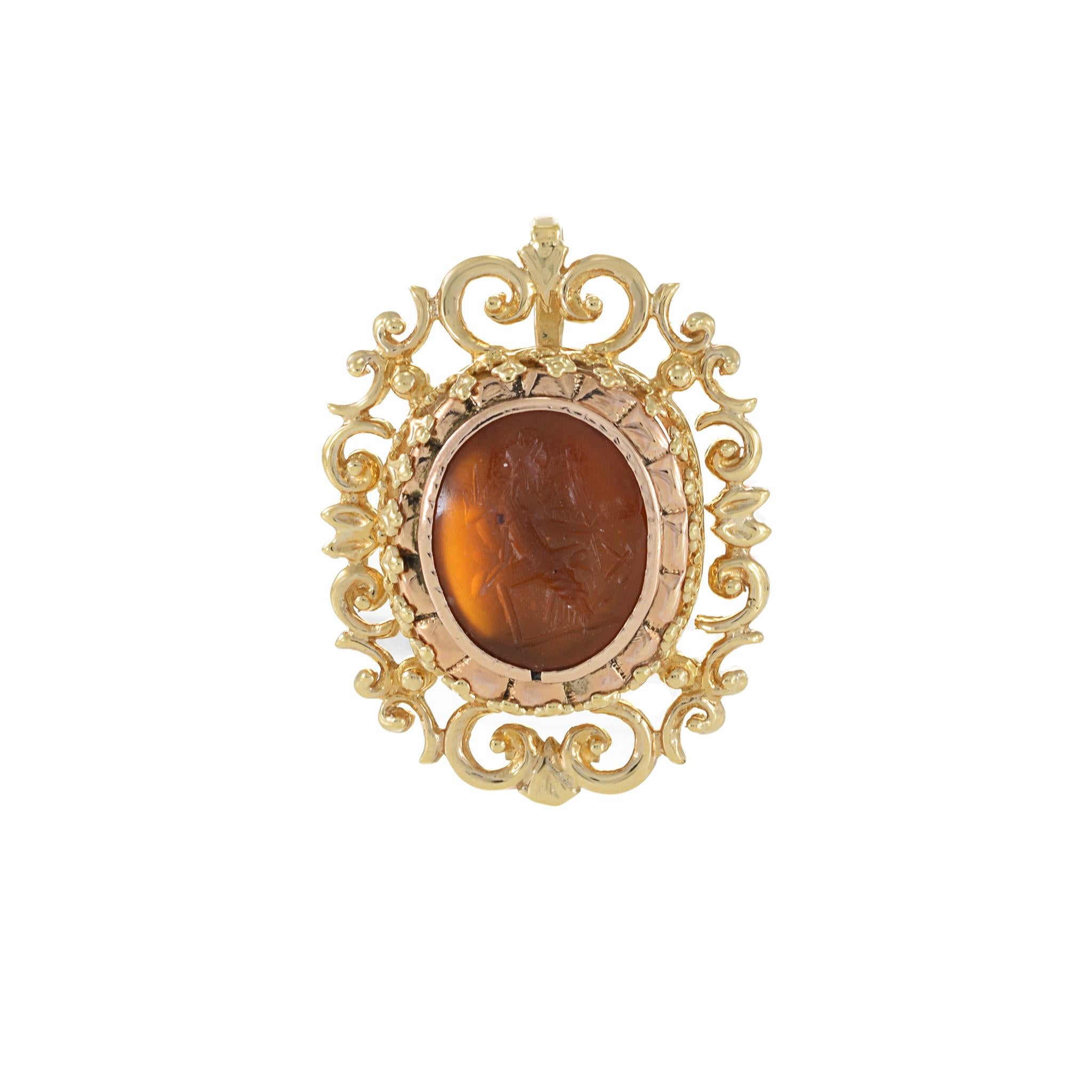 Victorian Era 14KT Yellow/Rose Gold Carnelian Intaglio Pendant, a stunning piece evoking the romance and elegance of its time. Crafted with intricate detail, this pendant features a captivating carnelian intaglio set in a blend of yellow and rose