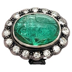 Victorian Era 15 Carat Carved Emerald Beetle Motif Antique Diamond Halo Ring
